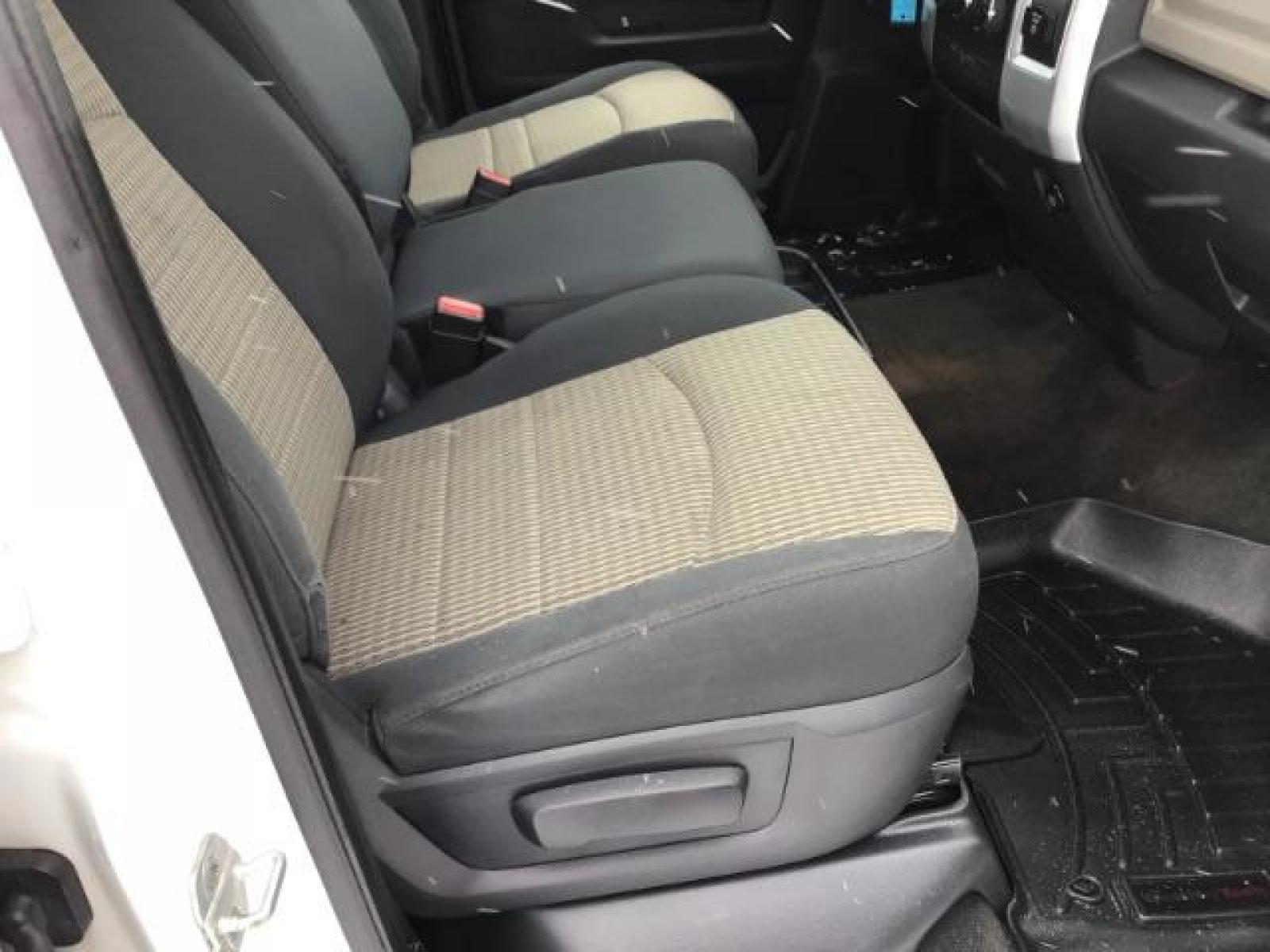 2012 Bright White /Dark Slate/Medium Graystone Cloth Interior RAM 3500 SLT Crew Cab SWB 4WD (3C63D3DLXCG) with an 6.7L L6 OHV 24V TURBO DIESEL engine, 6-Speed Automatic transmission, located at 1235 N Woodruff Ave., Idaho Falls, 83401, (208) 523-1053, 43.507172, -112.000488 - This 2012 Ram 3500 4x4 SLT, has the 6.7L diesel motor. It has 153,000 miles. Comes with cloth seats, AM/FM blue tooth stereo, power locks and windows. At Timberline Auto it is always easy to find a great deal on your next vehicle! Our experienced sales staff can help find the right vehicle that will - Photo #21