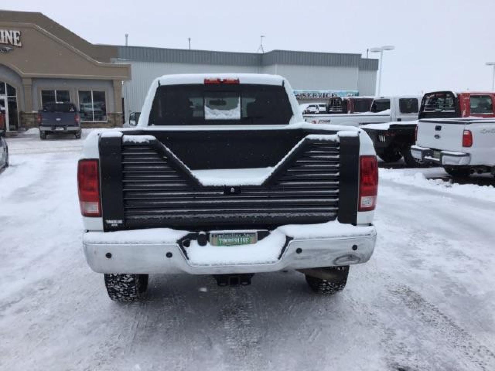 2012 Bright White /Dark Slate/Medium Graystone Cloth Interior RAM 3500 SLT Crew Cab SWB 4WD (3C63D3DLXCG) with an 6.7L L6 OHV 24V TURBO DIESEL engine, 6-Speed Automatic transmission, located at 1235 N Woodruff Ave., Idaho Falls, 83401, (208) 523-1053, 43.507172, -112.000488 - This 2012 Ram 3500 4x4 SLT, has the 6.7L diesel motor. It has 153,000 miles. Comes with cloth seats, AM/FM blue tooth stereo, power locks and windows. At Timberline Auto it is always easy to find a great deal on your next vehicle! Our experienced sales staff can help find the right vehicle that will - Photo #3