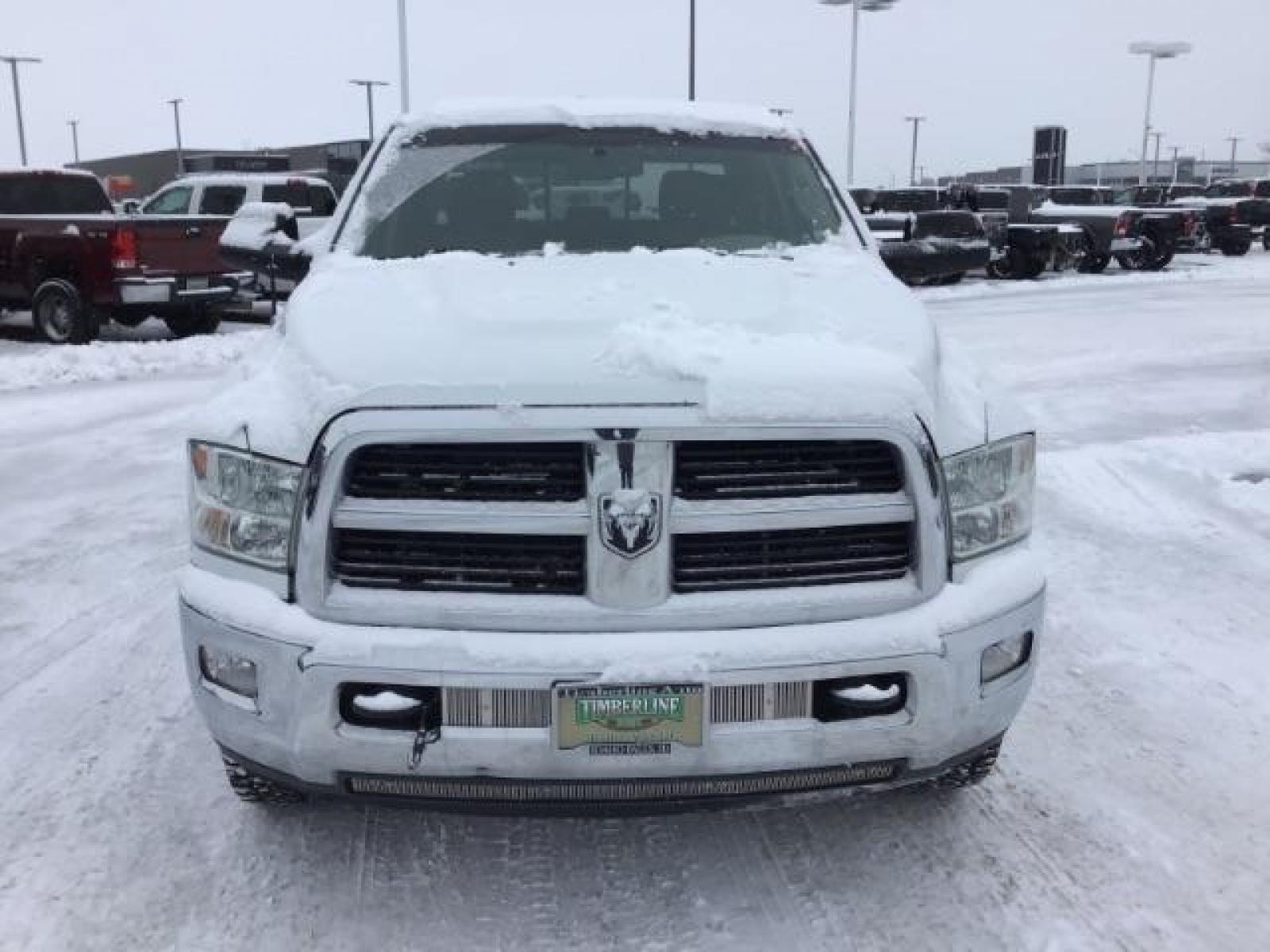 2012 Bright White /Dark Slate/Medium Graystone Cloth Interior RAM 3500 SLT Crew Cab SWB 4WD (3C63D3DLXCG) with an 6.7L L6 OHV 24V TURBO DIESEL engine, 6-Speed Automatic transmission, located at 1235 N Woodruff Ave., Idaho Falls, 83401, (208) 523-1053, 43.507172, -112.000488 - This 2012 Ram 3500 4x4 SLT, has the 6.7L diesel motor. It has 153,000 miles. Comes with cloth seats, AM/FM blue tooth stereo, power locks and windows. At Timberline Auto it is always easy to find a great deal on your next vehicle! Our experienced sales staff can help find the right vehicle that will - Photo #7