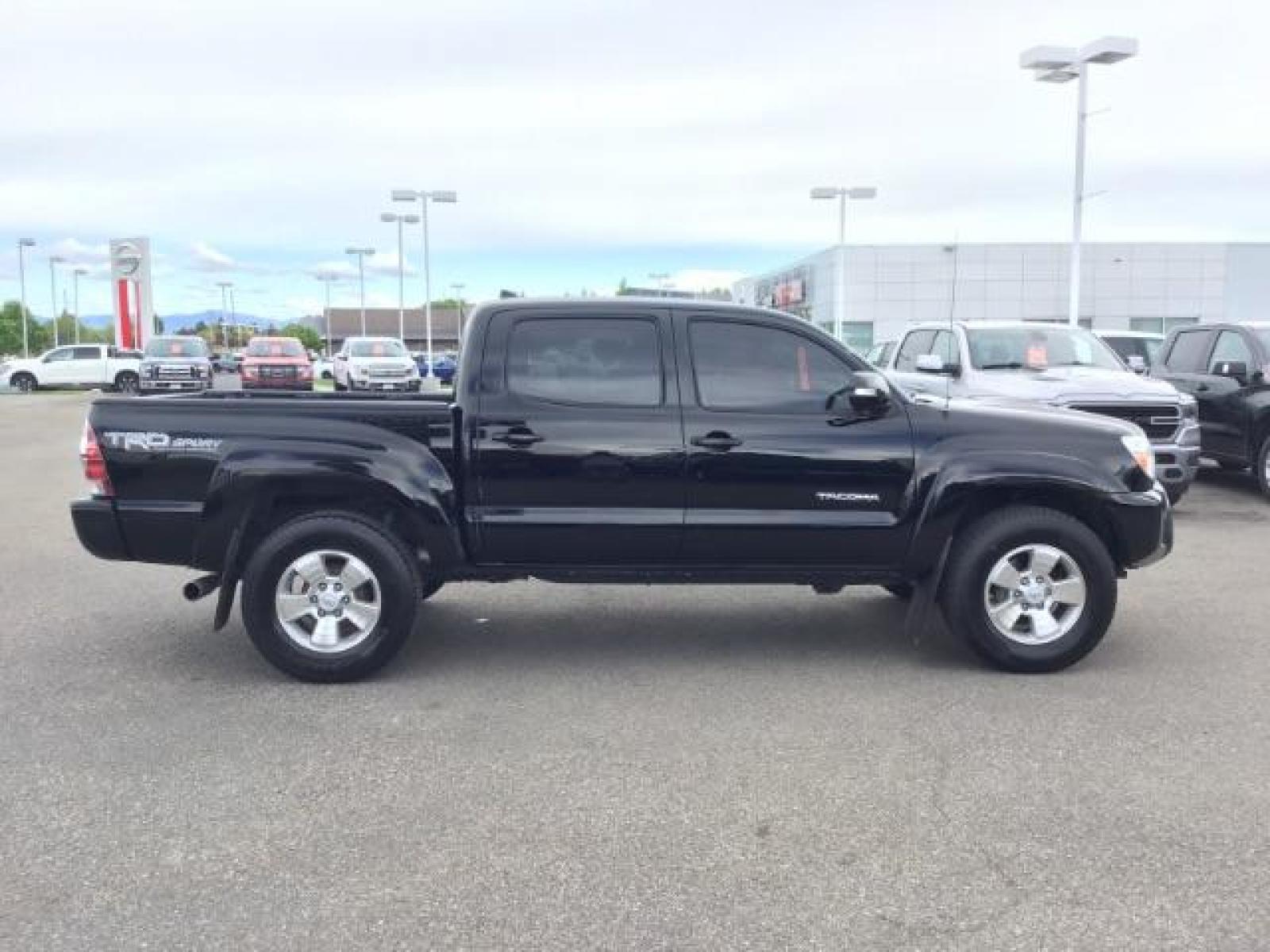 2015 Black /Gray, cloth Toyota Tacoma TRD SPORT Double Cab (3TMLU4EN8FM) with an 4.0L V6 DOHC 24V engine, Automatic transmission, located at 1235 N Woodruff Ave., Idaho Falls, 83401, (208) 523-1053, 43.507172, -112.000488 - Here's your chance at one of the most popular vehicles on the market! This Tacoma is in great shape inside and out! The TRD-SPORT gives you the color matched bumpers, the bigger display, and a few other goodies! The bed has a factory liner and the interior has rubber floor mats in the front with clo - Photo #6