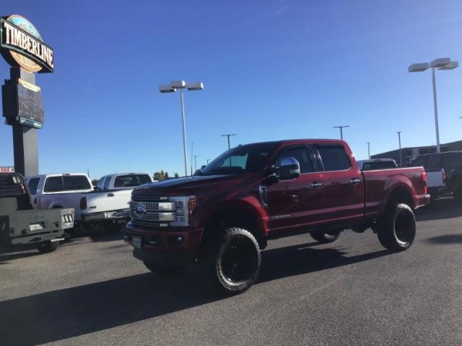 2018 RED /LEATHER Ford F-350 SD PLATINUM (1FT8W3BT4JE) with an 6.7 engine, AUTOMATIC transmission, located at 1235 N Woodruff Ave., Idaho Falls, 83401, (208) 523-1053, 43.507172, -112.000488 - This 2018 Ford F350 Platinum , has the 6.7L V8 diesel motor. Comes with retractable running boards, turnover ball, in the bed of the truck, push button start, navigation, lift kit, heated and cooled seats, sunroof, and bluetooth. At Timberline Auto it is always easy to find a great deal on your next - Photo #0
