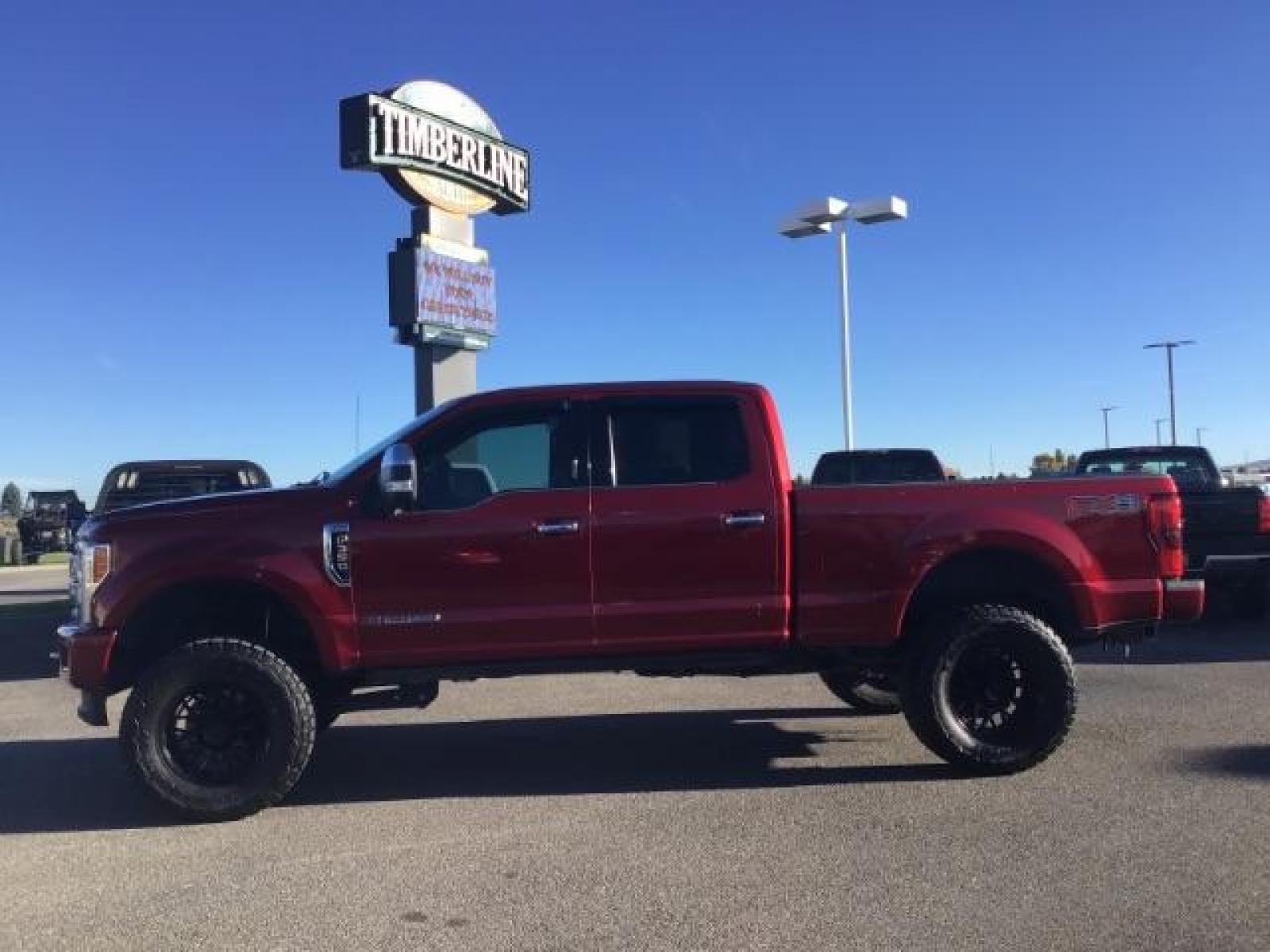 2018 RED /LEATHER Ford F-350 SD PLATINUM (1FT8W3BT4JE) with an 6.7 engine, AUTOMATIC transmission, located at 1235 N Woodruff Ave., Idaho Falls, 83401, (208) 523-1053, 43.507172, -112.000488 - This 2018 Ford F350 Platinum , has the 6.7L V8 diesel motor. Comes with retractable running boards, turnover ball, in the bed of the truck, push button start, navigation, lift kit, heated and cooled seats, sunroof, and bluetooth. At Timberline Auto it is always easy to find a great deal on your next - Photo #1