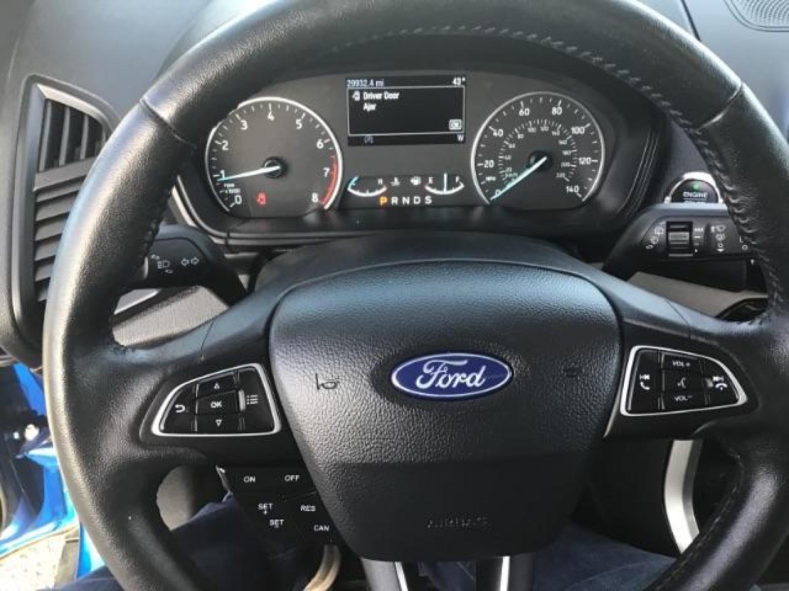 2020 Blue Candy Metallic Tinted Clearcoat /Medium Light Stone, leather Ford EcoSport Titanium AWD (MAJ6S3KL8LC) with an 2.0L L4 DOHC 16V engine, 6-Speed Automatic transmission, located at 1235 N Woodruff Ave., Idaho Falls, 83401, (208) 523-1053, 43.507172, -112.000488 - Photo #16