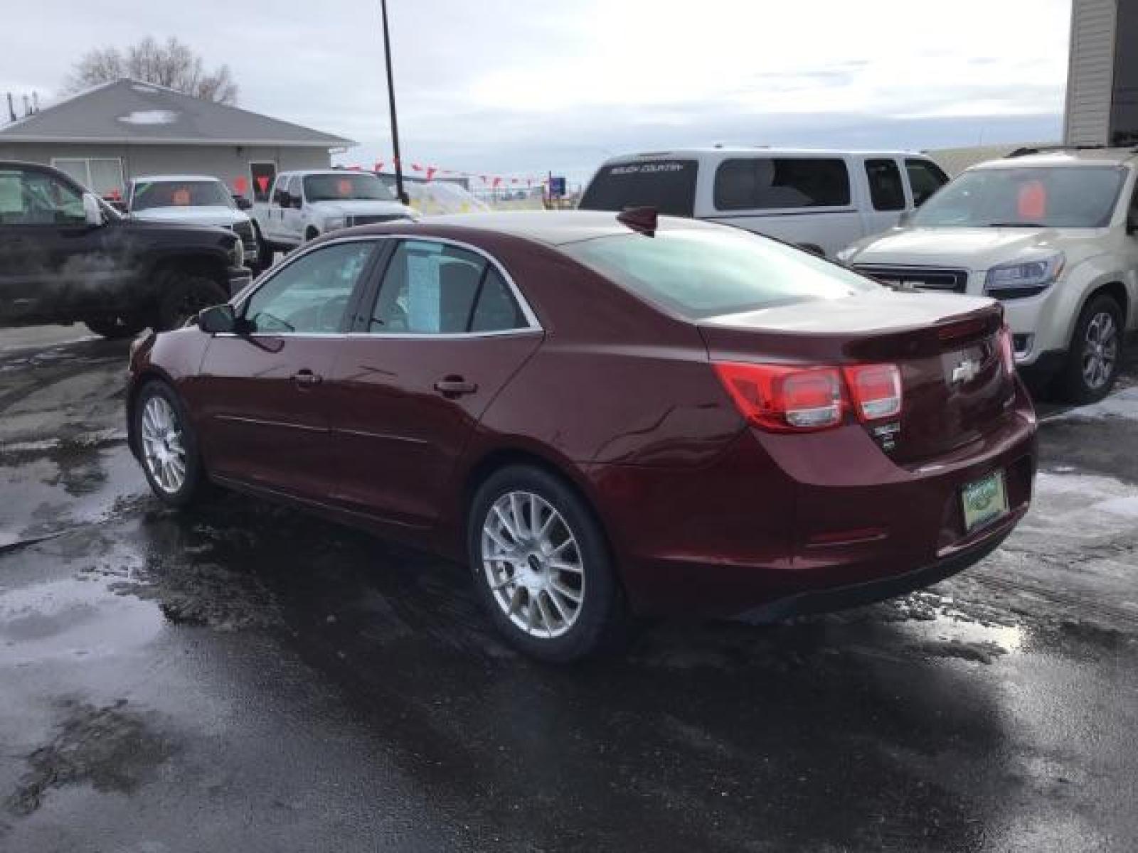 2015 Butte Red Metallic /Jet Black Chevrolet Malibu 2LT (1G11D5SL5FF) with an 2.5L L4 DOHC 16V engine, 6-Speed Automatic transmission, located at 1235 N Woodruff Ave., Idaho Falls, 83401, (208) 523-1053, 43.507172, -112.000488 - This 2015 Chevrolet Malibu 2LT, has 134,000 miles. Comes with Leather interior, heated seats, power seats, blue tooth audio, touch screen stereo, and back up camera. At Timberline Auto it is always easy to find a great deal on your next vehicle! Our experienced sales staff can help find the right v - Photo #2