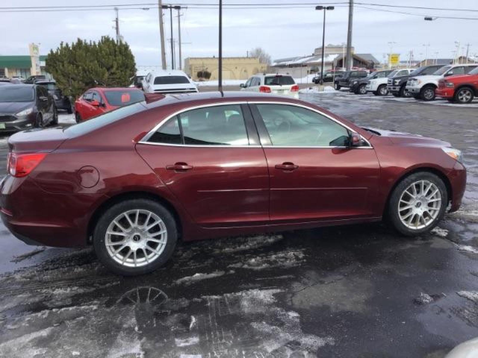 2015 Butte Red Metallic /Jet Black Chevrolet Malibu 2LT (1G11D5SL5FF) with an 2.5L L4 DOHC 16V engine, 6-Speed Automatic transmission, located at 1235 N Woodruff Ave., Idaho Falls, 83401, (208) 523-1053, 43.507172, -112.000488 - This 2015 Chevrolet Malibu 2LT, has 134,000 miles. Comes with Leather interior, heated seats, power seats, blue tooth audio, touch screen stereo, and back up camera. At Timberline Auto it is always easy to find a great deal on your next vehicle! Our experienced sales staff can help find the right v - Photo #5