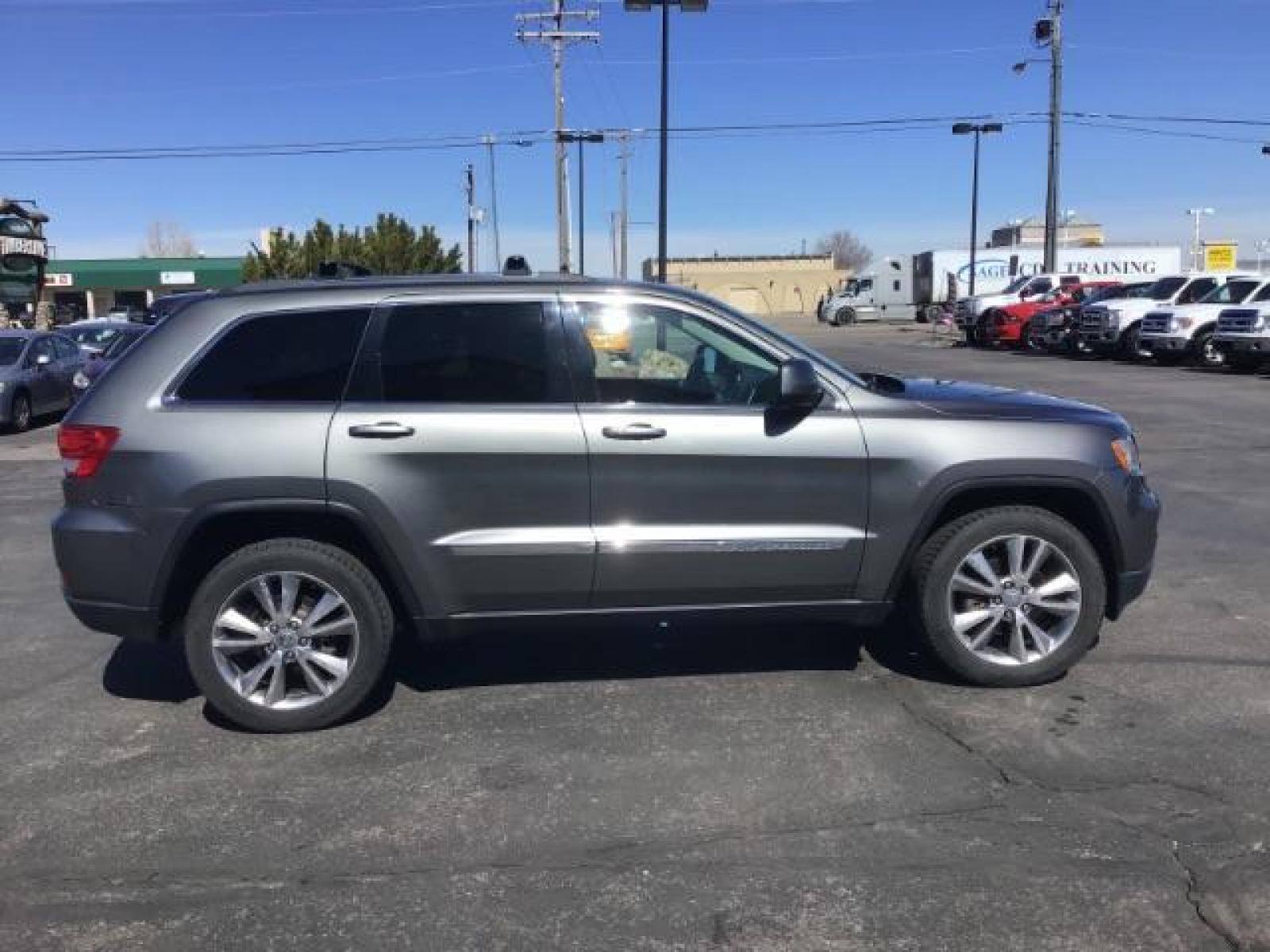 2013 Jeep Grand Cherokee Laredo 4WD (1C4RJFAG5DC) with an 3.6L V6 DOHC 24V engine, 5-Speed Automatic transmission, located at 1235 N Woodruff Ave., Idaho Falls, 83401, (208) 523-1053, 43.507172, -112.000488 - This Jeep Grand Cherokee Laredo 4x4 , has the 3.2L V6 motor. It has 150,000 miles. It comes with leather interior, cruise control, back up camera, powered seats, and power windows and locks. At Timberline Auto it is always easy to find a great deal on your next vehicle! Our experienced sales staff c - Photo #5