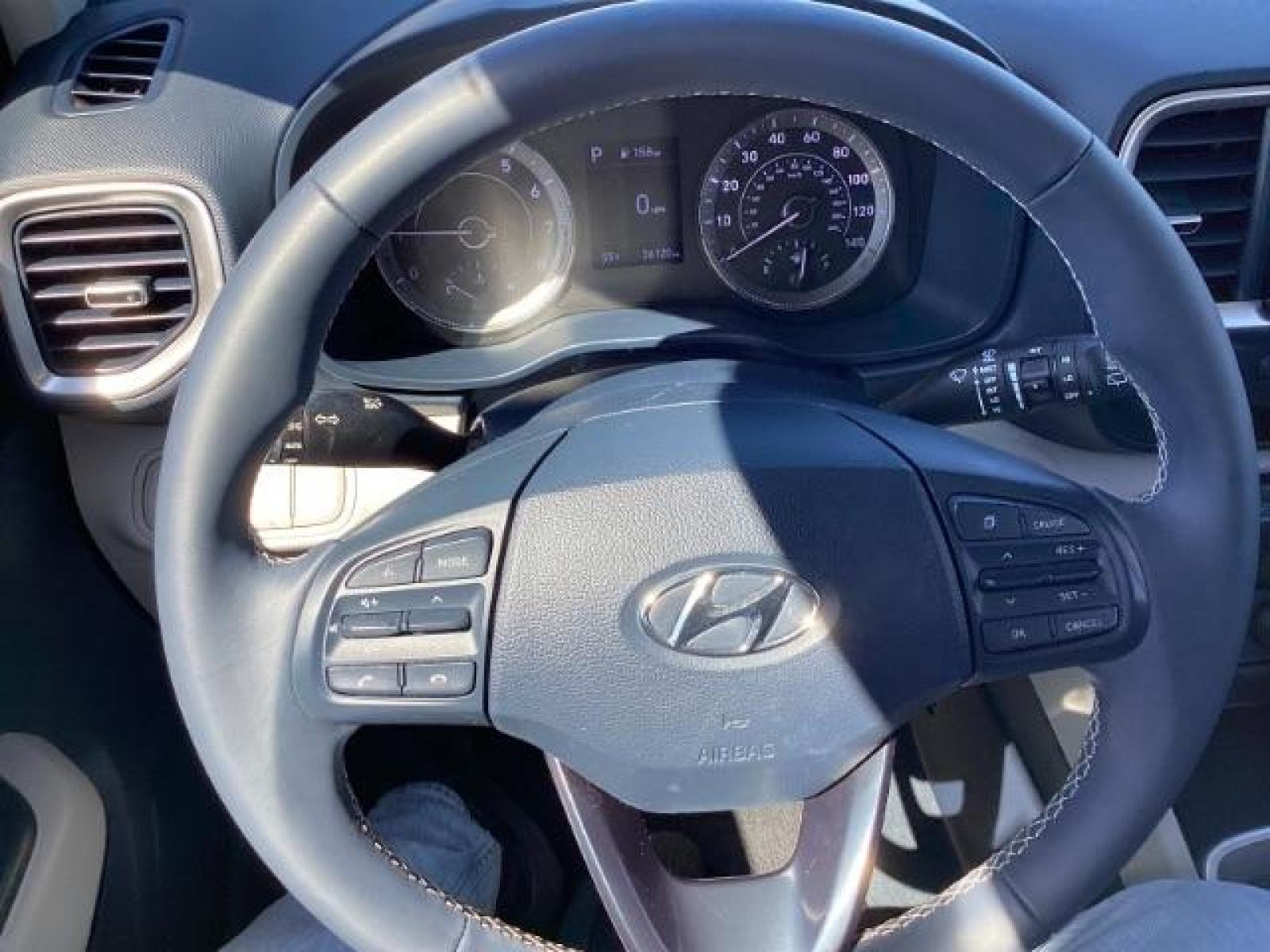 2021 Intense Blue /Black Hyundai Venue SEL (KMHRC8A36MU) with an 1.6L L4 DOHC 16V engine, Continuously Variable Transmission transmission, located at 1235 N Woodruff Ave., Idaho Falls, 83401, (208) 523-1053, 43.507172, -112.000488 - The 2021 Hyundai Venue Denim is a unique trim level of the Venue, Hyundai's subcompact SUV. The Denim trim offers several features and styling elements that set it apart from other trims. Here are some of the notable features you might find on the 2021 Hyundai Venue Denim: Denim Exterior Color: The - Photo #14
