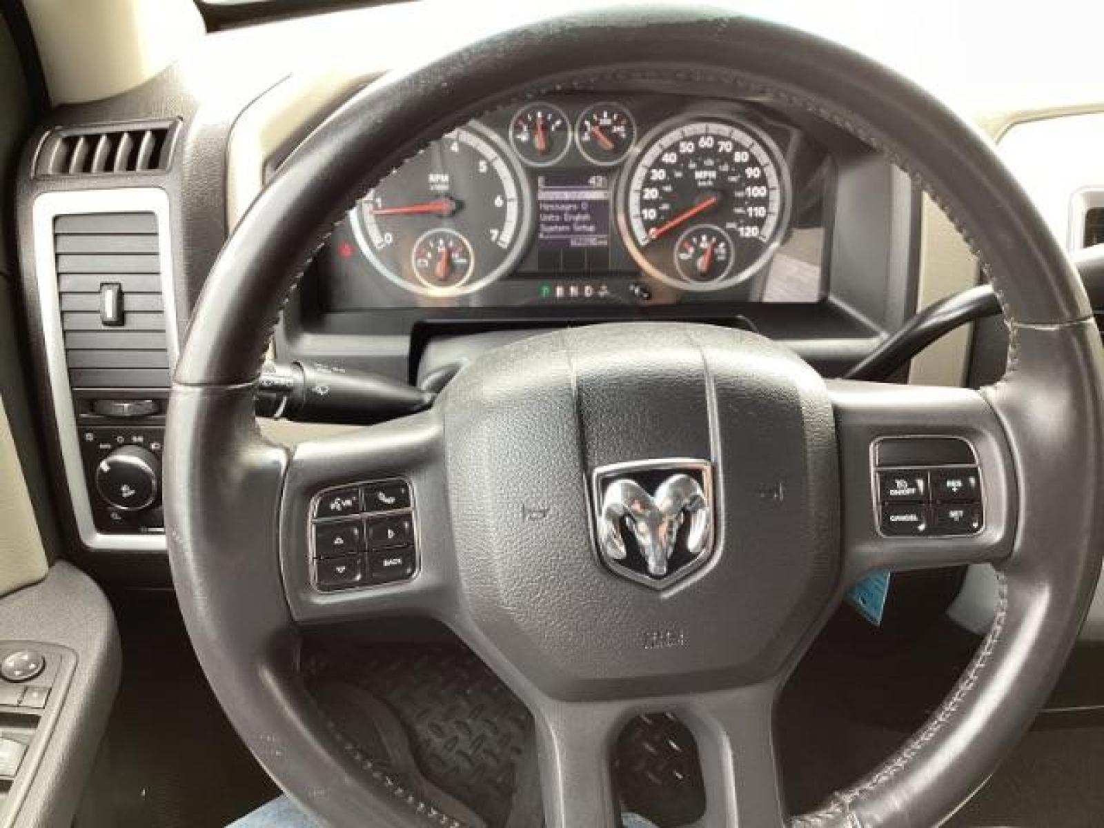 2012 RAM 1500 SLT Quad Cab 4WD (1C6RD7GT7CS) with an 5.7L V8 OHV 16V engine, 5-Speed Automatic transmission, located at 1235 N Woodruff Ave., Idaho Falls, 83401, (208) 523-1053, 43.507172, -112.000488 - Photo #14