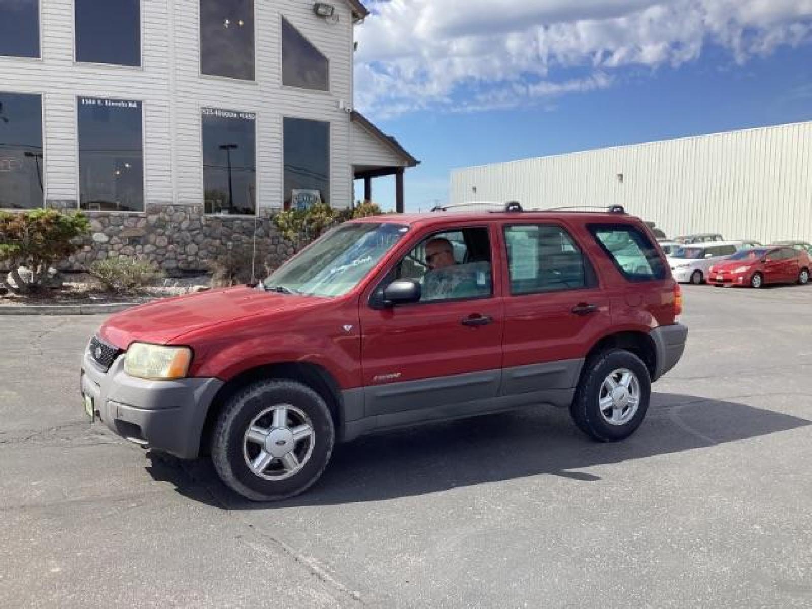 2001 Toreador Red Clearcoat Metallic /Medium Graphite Cloth Ford Escape XLS 4WD (1FMYU02121K) with an 3.0L V6 DOHC 24V engine, located at 1235 N Woodruff Ave., Idaho Falls, 83401, (208) 523-1053, 43.507172, -112.000488 - New Inventory. Going thru service and inspect. Call for more pictures. At Timberline Auto it is always easy to find a great deal on your next vehicle! Our experienced sales staff can help find the right vehicle will fit your needs. Our knowledgeable finance department has options for almost any cred - Photo #0