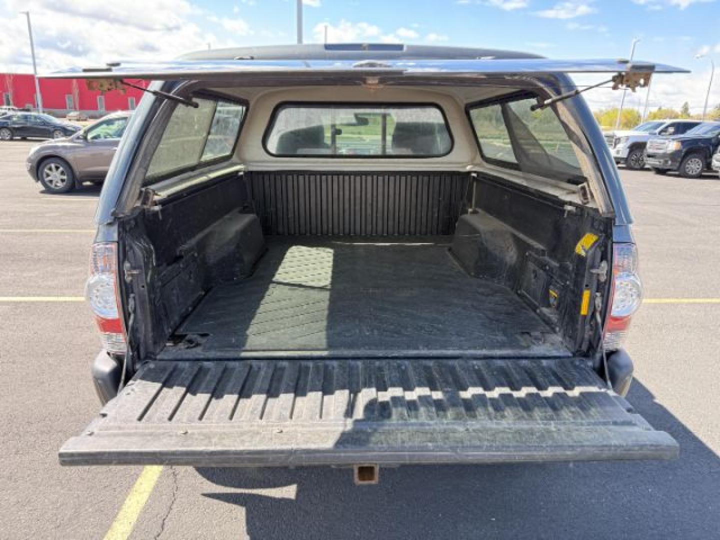 2013 Magnetic Gray Metallic /Graphite Toyota Tacoma Base V6 (5TFUU4EN9DX) with an 4L V-6 DOHC engine, MANUAL transmission, located at 1235 N Woodruff Ave., Idaho Falls, 83401, (208) 523-1053, 43.507172, -112.000488 - At Timberline Auto, finding a great deal on your next vehicle is always easy! Our experienced sales staff's goal is to help find you the right vehicle at the right price! Our knowledgeable finance department has options for almost any credit score. We offer extended service contract options to prote - Photo#5