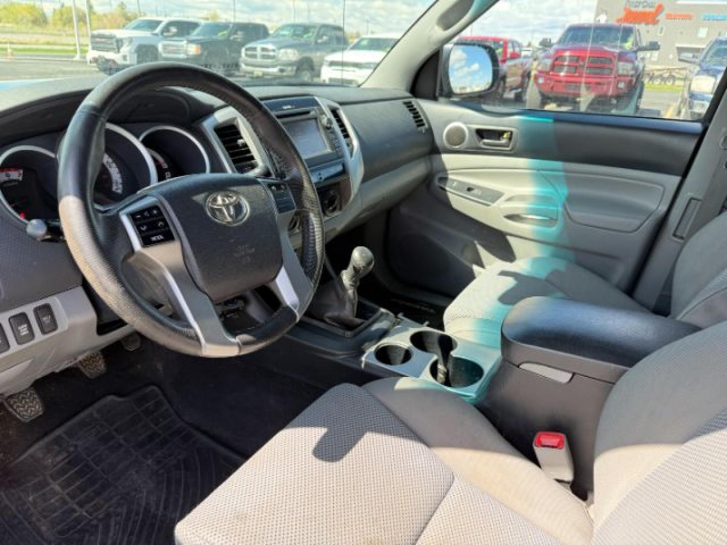 2013 Magnetic Gray Metallic /Graphite Toyota Tacoma Base V6 (5TFUU4EN9DX) with an 4L V-6 DOHC engine, MANUAL transmission, located at 1235 N Woodruff Ave., Idaho Falls, 83401, (208) 523-1053, 43.507172, -112.000488 - At Timberline Auto, finding a great deal on your next vehicle is always easy! Our experienced sales staff's goal is to help find you the right vehicle at the right price! Our knowledgeable finance department has options for almost any credit score. We offer extended service contract options to prote - Photo#11
