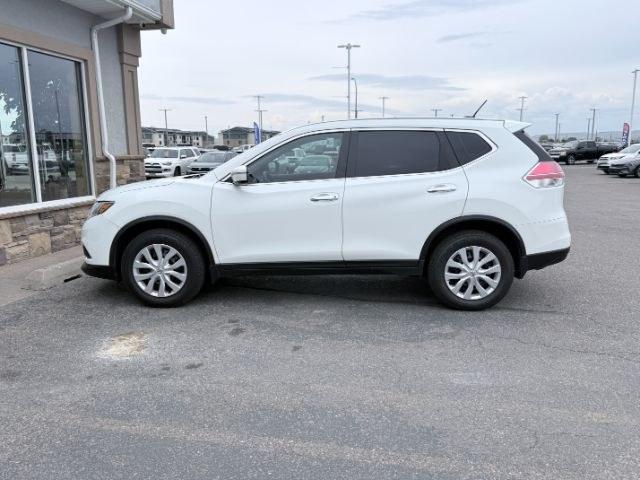 2015 WHITE /Charcoal Nissan Rogue (KNMAT2MV1FP) with an 25L I-4 DOHC engine, Automatic transmission, located at 1175 N Woodruff Ave, Idaho Falls, ID, 83401, 43.506901, -111.999657 - At Timberline Auto, finding a great deal on your next vehicle is always easy! Our experienced sales staff goal is to help find you the right vehicle at the right price! Our knowledgeable finance department has options for almost any credit score. We offer extended service contract options to prot- Photo#0