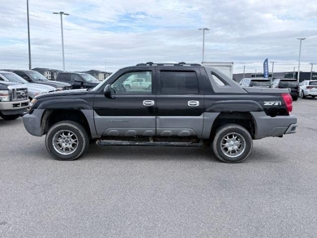 2002 Onyx Black /Graphite Cloth Interior Chevrolet Avalanche (3GNEK13T32G) with an 53L V8 OHV 16V engine, Automatic transmission, located at 1175 N Woodruff Ave, Idaho Falls, ID, 83401, 43.506901, -111.999657 - At Timberline Auto, finding a great deal on your next vehicle is always easy! Our experienced sales staff goal is to help find you the right vehicle at the right price! Our knowledgeable finance department has options for almost any credit score. We offer extended service contract options to prot- Photo#1