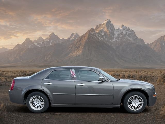 2010 Dark Titanium Metallic Clearcoat /Dark Slate Gray Chrysler 300 Touring (2C3CA5CV2AH) with an V6, 3.5L engine, 4-Speed Automatic transmission, located at 1175 N Woodruff Ave, Idaho Falls, ID, 83401, 43.506901, -111.999657 - <b>Vehicle Details</b><br>Refined and comfortable, this 2010 Chrysler 300 Touring delivers classic full-size sedan style with a confident rear-wheel-drive layout and a smooth V6, 3.5L gasoline engine. Located in Idaho Falls, ID, this well-appointed Chrysler 300 offers a spacious cabin designed for e- Photo#2