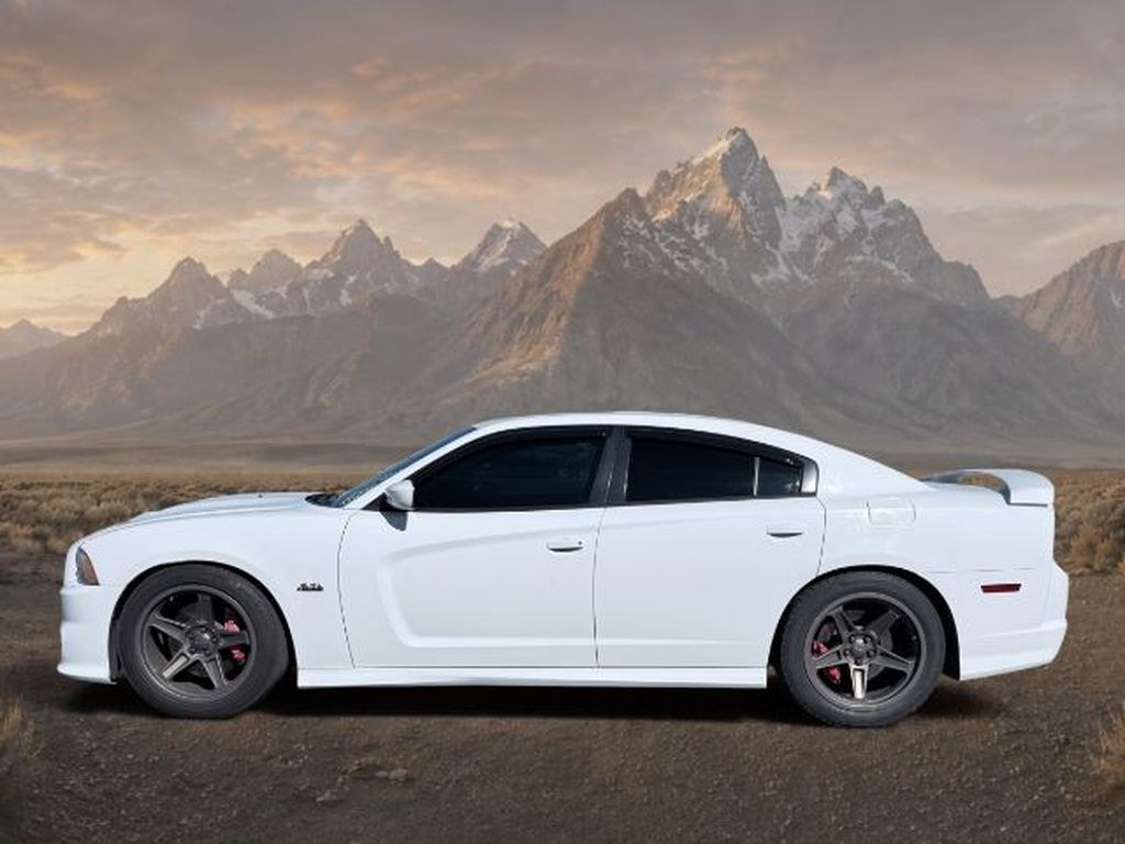 2012 Bright White Clearcoat /Black Dodge Charger SRT8 (2C3CDXEJ5CH) with an V8, 6.4L engine, 5-speed automatic transmission, located at 1175 N Woodruff Ave, Idaho Falls, ID, 83401, 43.506901, -111.999657 - <b>Vehicle Details</b><br>91 OCTANE ONLY<br><br><b>Equipment</b><br>The leather seats in this large car are a must for buyers looking for comfort, durability, and style. The state of the art park assist system will guide you easily into any spot. The Dodge Charger keeps you comfortable with Auto Cli- Photo#0