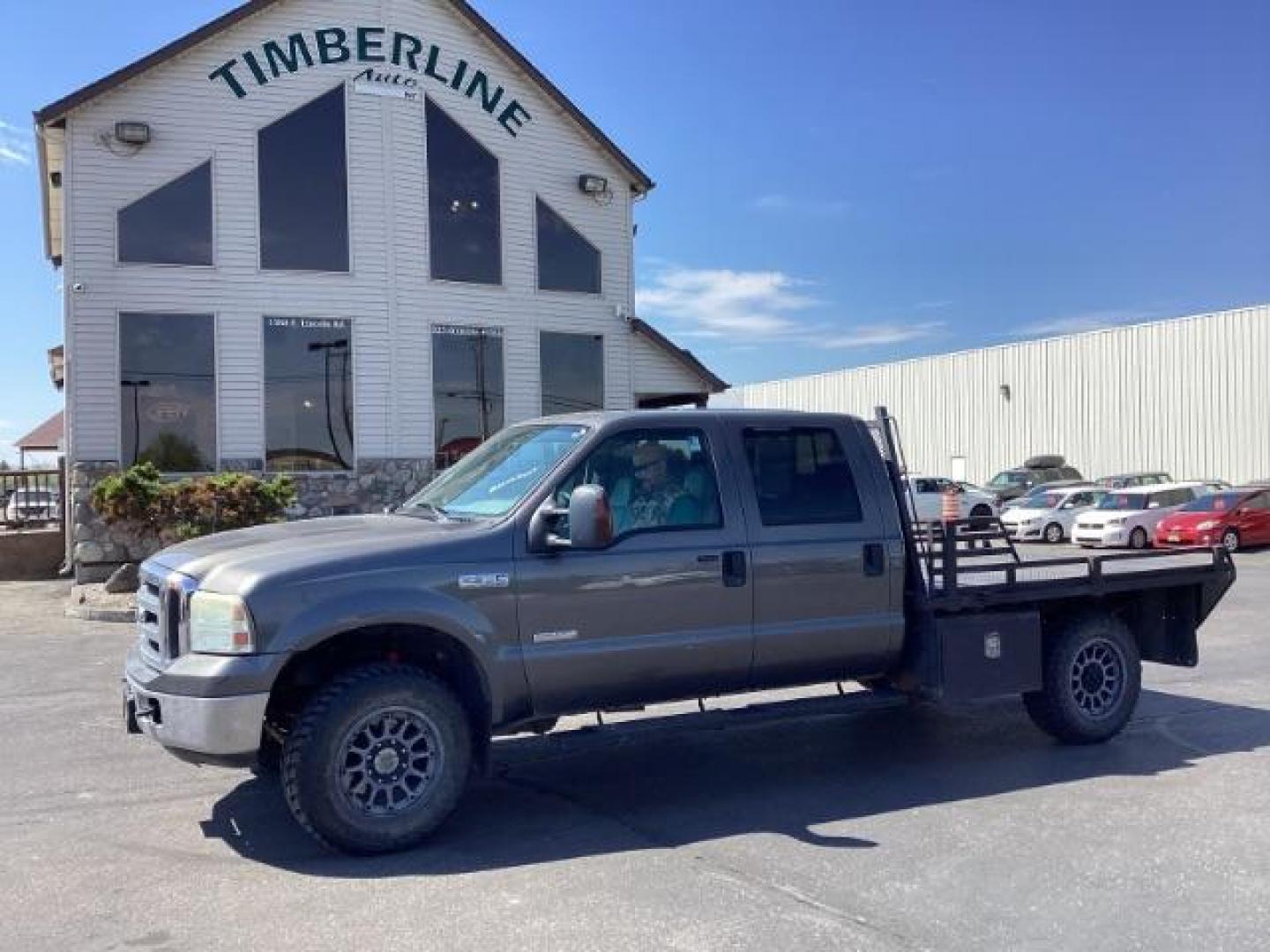 2006 GRAY /Medium Flint Leather Interior Ford F-350 SD Lariat Crew Cab Long Bed 4WD (1FTWW31P36E) with an 6.0L V8 OHV 32V TURBO DIESEL engine, located at 1235 N Woodruff Ave., Idaho Falls, 83401, (208) 523-1053, 43.507172, -112.000488 - Photo#0