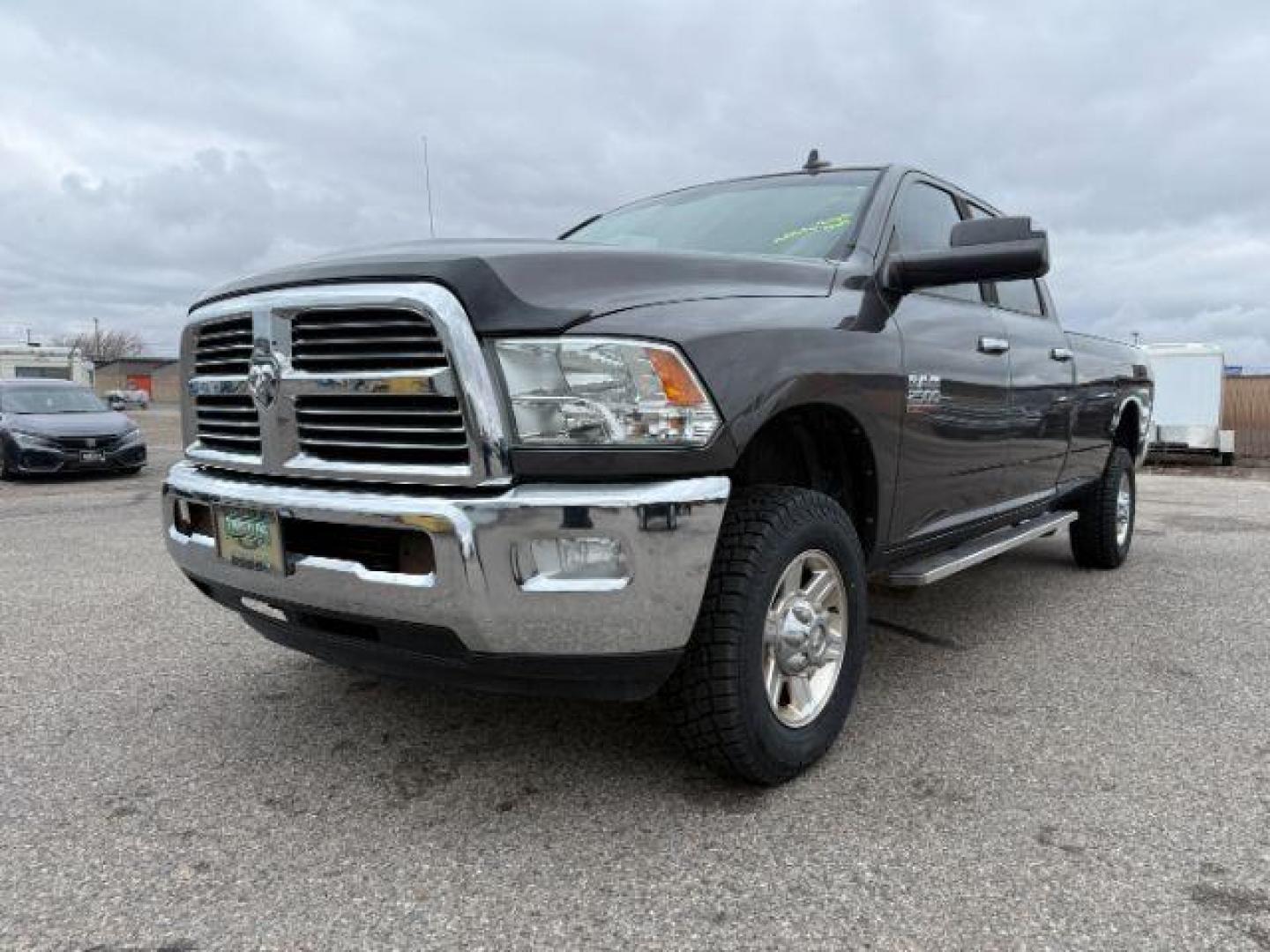 2014 GRAY /Diesel Gray/Black Ram 2500 (3C6TR5JT8EG) , Automatic transmission, located at 1175 N Woodruff Ave, Idaho Falls, ID, 83401, 43.506901, -111.999657 - At Timberline Auto, finding a great deal on your next vehicle is always easy! Our experienced sales staff's goal is to help find you the right vehicle at the right price! Our knowledgeable finance department has options for almost any credit score. We offer extended service contract options to prote - Photo#21