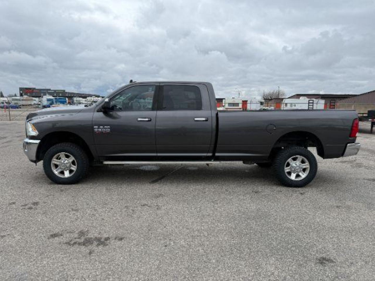 2014 GRAY /Diesel Gray/Black Ram 2500 (3C6TR5JT8EG) , Automatic transmission, located at 1175 N Woodruff Ave, Idaho Falls, ID, 83401, 43.506901, -111.999657 - At Timberline Auto, finding a great deal on your next vehicle is always easy! Our experienced sales staff's goal is to help find you the right vehicle at the right price! Our knowledgeable finance department has options for almost any credit score. We offer extended service contract options to prote - Photo#22