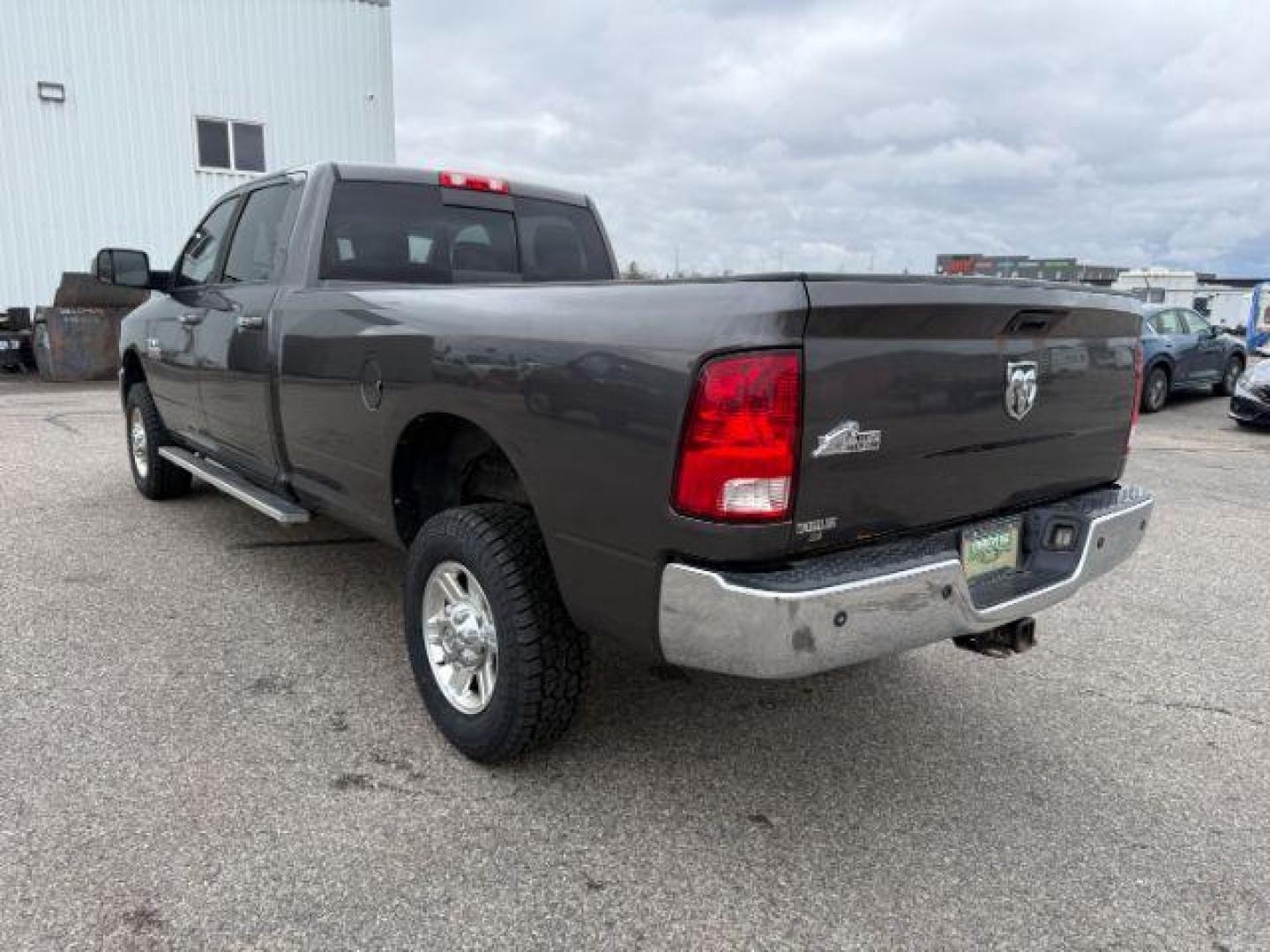 2014 GRAY /Diesel Gray/Black Ram 2500 (3C6TR5JT8EG) , Automatic transmission, located at 1175 N Woodruff Ave, Idaho Falls, ID, 83401, 43.506901, -111.999657 - At Timberline Auto, finding a great deal on your next vehicle is always easy! Our experienced sales staff's goal is to help find you the right vehicle at the right price! Our knowledgeable finance department has options for almost any credit score. We offer extended service contract options to prote - Photo#23