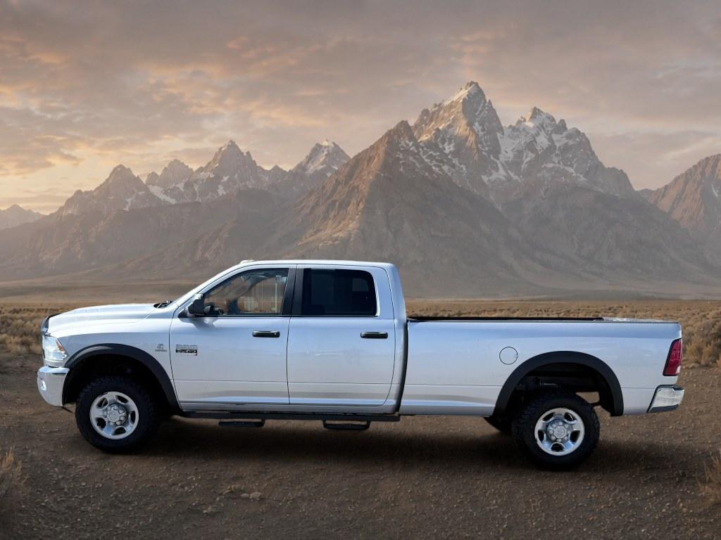 2012 Bright Silver Metallic Clearcoat /CLOTH Ram 3500 SLT (3C63D3HL0CG) with an 6 Cyl, 6.7L engine, 6-speed manual transmission, located at 1175 N Woodruff Ave, Idaho Falls, ID, 83401, 43.506901, -111.999657 - <b>Vehicle Details</b><br>Take on heavy-duty jobs with confidence in this **pre-owned 2012 Ram 3500 SLT 4WD** now available in **Idaho Falls, ID**. Built for drivers who need serious capability, this rugged Ram pairs a powerful **6.7L 6-cylinder Diesel engine** with proven **four-wheel drive** perfo- Photo#1