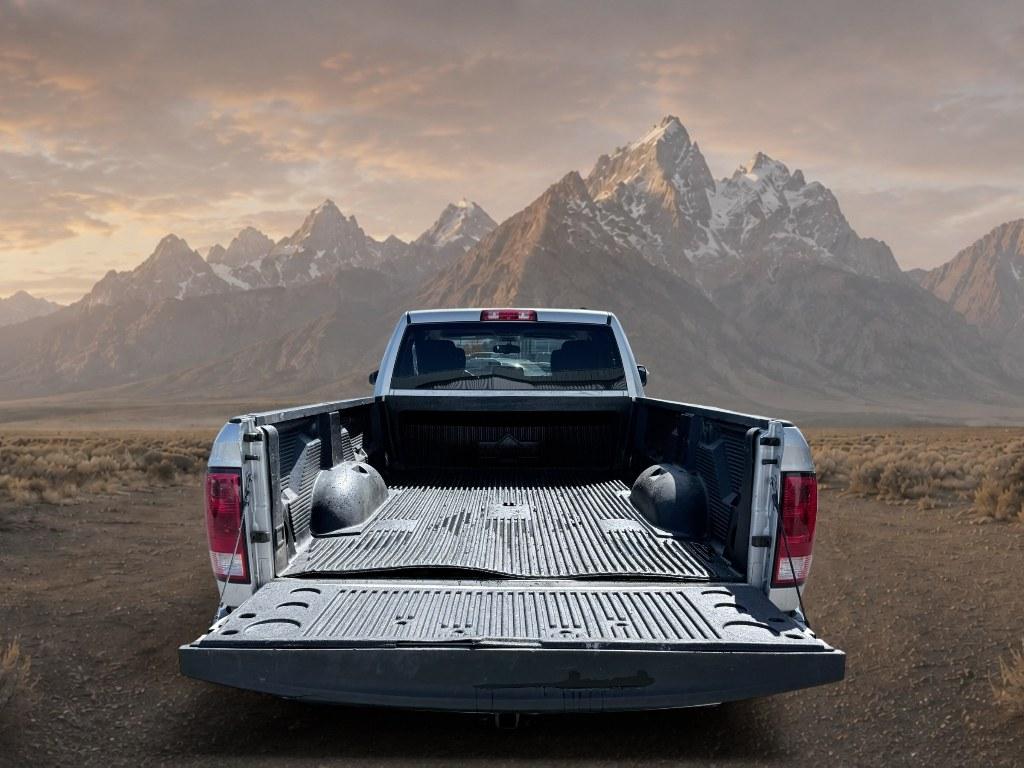 2012 Bright Silver Metallic Clearcoat /CLOTH Ram 3500 SLT (3C63D3HL0CG) with an 6 Cyl, 6.7L engine, 6-speed manual transmission, located at 1175 N Woodruff Ave, Idaho Falls, ID, 83401, 43.506901, -111.999657 - <b>Vehicle Details</b><br>Take on heavy-duty jobs with confidence in this **pre-owned 2012 Ram 3500 SLT 4WD** now available in **Idaho Falls, ID**. Built for drivers who need serious capability, this rugged Ram pairs a powerful **6.7L 6-cylinder Diesel engine** with proven **four-wheel drive** perfo- Photo#4