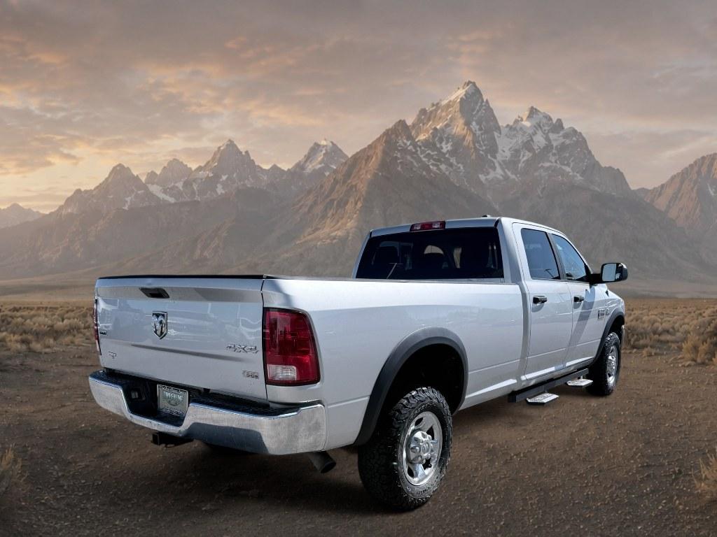 2012 Bright Silver Metallic Clearcoat /CLOTH Ram 3500 SLT (3C63D3HL0CG) with an 6 Cyl, 6.7L engine, 6-speed manual transmission, located at 1175 N Woodruff Ave, Idaho Falls, ID, 83401, 43.506901, -111.999657 - <b>Vehicle Details</b><br>Take on heavy-duty jobs with confidence in this **pre-owned 2012 Ram 3500 SLT 4WD** now available in **Idaho Falls, ID**. Built for drivers who need serious capability, this rugged Ram pairs a powerful **6.7L 6-cylinder Diesel engine** with proven **four-wheel drive** perfo- Photo#5