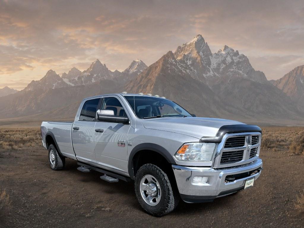 2012 Bright Silver Metallic Clearcoat /CLOTH Ram 3500 SLT (3C63D3HL0CG) with an 6 Cyl, 6.7L engine, 6-speed manual transmission, located at 1175 N Woodruff Ave, Idaho Falls, ID, 83401, 43.506901, -111.999657 - <b>Vehicle Details</b><br>Take on heavy-duty jobs with confidence in this **pre-owned 2012 Ram 3500 SLT 4WD** now available in **Idaho Falls, ID**. Built for drivers who need serious capability, this rugged Ram pairs a powerful **6.7L 6-cylinder Diesel engine** with proven **four-wheel drive** perfo- Photo#7