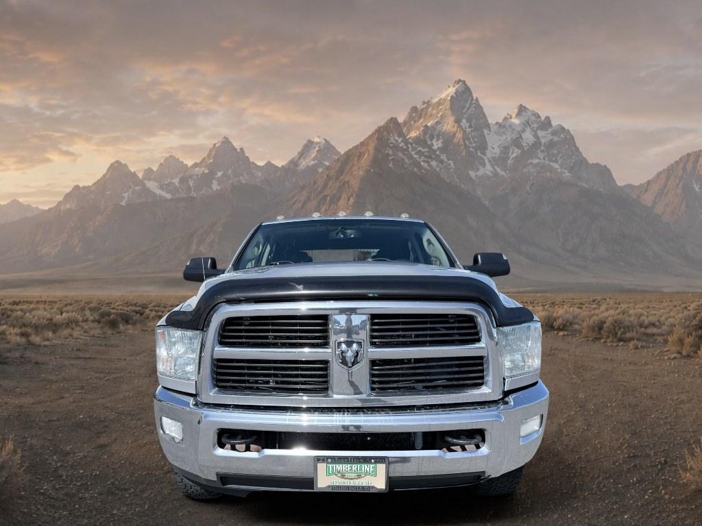 2012 Bright Silver Metallic Clearcoat /CLOTH Ram 3500 SLT (3C63D3HL0CG) with an 6 Cyl, 6.7L engine, 6-speed manual transmission, located at 1175 N Woodruff Ave, Idaho Falls, ID, 83401, 43.506901, -111.999657 - <b>Vehicle Details</b><br>Take on heavy-duty jobs with confidence in this **pre-owned 2012 Ram 3500 SLT 4WD** now available in **Idaho Falls, ID**. Built for drivers who need serious capability, this rugged Ram pairs a powerful **6.7L 6-cylinder Diesel engine** with proven **four-wheel drive** perfo- Photo#8