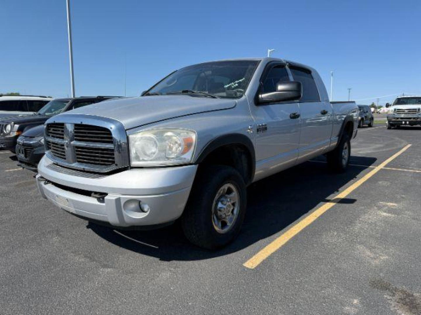 2007 Bright Silver Metallic /Medium Slate Gray Cloth Interior Dodge Ram 3500 SLT Mega Cab 4WD DRW (3D7MX39C27G) with an 5.9L L6 OHV 24V TURBO DIESEL engine, 4-Speed Automatic transmission, located at 1235 N Woodruff Ave., Idaho Falls, 83401, (208) 523-1053, 43.507172, -112.000488 - At Timberline Auto, finding a great deal on your next vehicle is always easy! Our experienced sales staff's goal is to help find you the right vehicle at the right price! Our knowledgeable finance department has options for almost any credit score. We offer extended service contract options to prote - Photo#1
