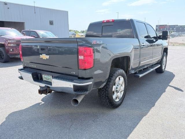 2017 GRAY /Jet Black Chevrolet Silverado 2500HD (1GC1KWEY9HF) with an Duramax 66L V-8 diesel direct injection engine, Automatic transmission, located at 1175 N Woodruff Ave, Idaho Falls, ID, 83401, 43.506901, -111.999657 - At Timberline Auto, finding a great deal on your next vehicle is always easy! Our experienced sales staff goal is to help find you the right vehicle at the right price! Our knowledgeable finance department has options for almost any credit score. We offer extended service contract options to prot- Photo#34