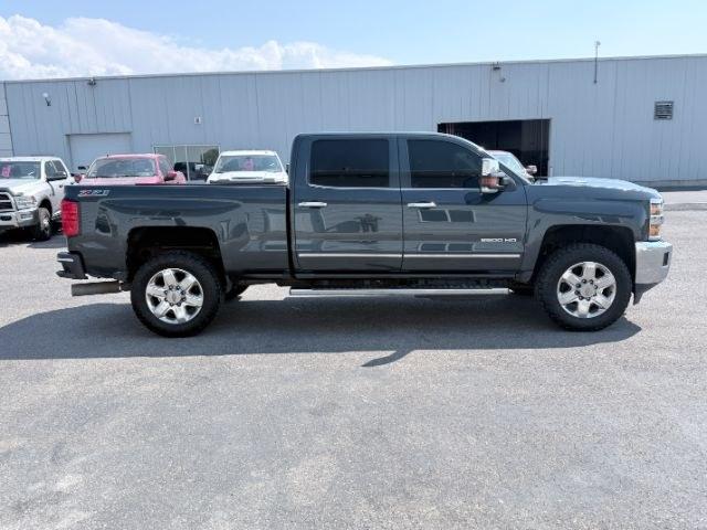 2017 GRAY /Jet Black Chevrolet Silverado 2500HD (1GC1KWEY9HF) with an Duramax 66L V-8 diesel direct injection engine, Automatic transmission, located at 1175 N Woodruff Ave, Idaho Falls, ID, 83401, 43.506901, -111.999657 - At Timberline Auto, finding a great deal on your next vehicle is always easy! Our experienced sales staff goal is to help find you the right vehicle at the right price! Our knowledgeable finance department has options for almost any credit score. We offer extended service contract options to prot- Photo#35