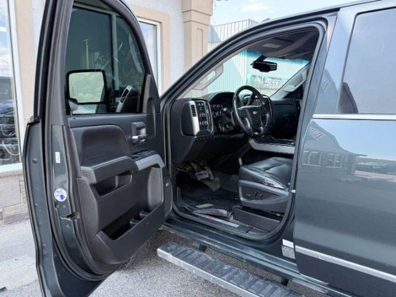 2017 GRAY /Jet Black Chevrolet Silverado LTZ (1GC1KWEY9HF) with an V8, 6.6L engine, 6-speed automatic transmission, located at 1175 N Woodruff Ave, Idaho Falls, ID, 83401, 43.506901, -111.999657 - <b>Vehicle Details</b><br>Take on tough jobs and weekend adventures with confidence in this 2017 Chevrolet Silverado 2500 LTZ 4WD, now available in Idaho Falls, ID. Powered by a proven V8 6.6L Diesel engine, this heavy-duty pickup delivers impressive towing strength, refined comfort, and the dependa- Photo#12