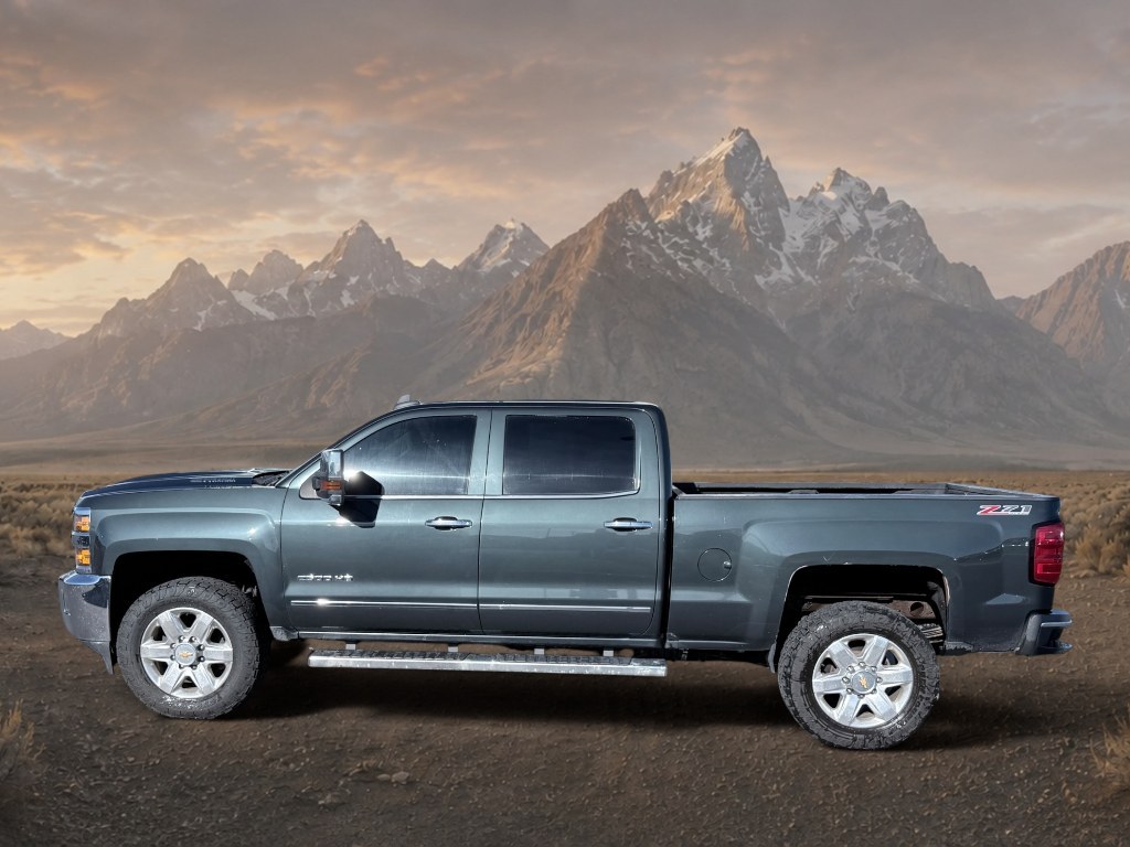 2017 GRAY /Jet Black Chevrolet Silverado LTZ (1GC1KWEY9HF) with an V8, 6.6L engine, 6-speed automatic transmission, located at 1175 N Woodruff Ave, Idaho Falls, ID, 83401, 43.506901, -111.999657 - <b>Vehicle Details</b><br>Take on tough jobs and weekend adventures with confidence in this 2017 Chevrolet Silverado 2500 LTZ 4WD, now available in Idaho Falls, ID. Powered by a proven V8 6.6L Diesel engine, this heavy-duty pickup delivers impressive towing strength, refined comfort, and the dependa- Photo#1