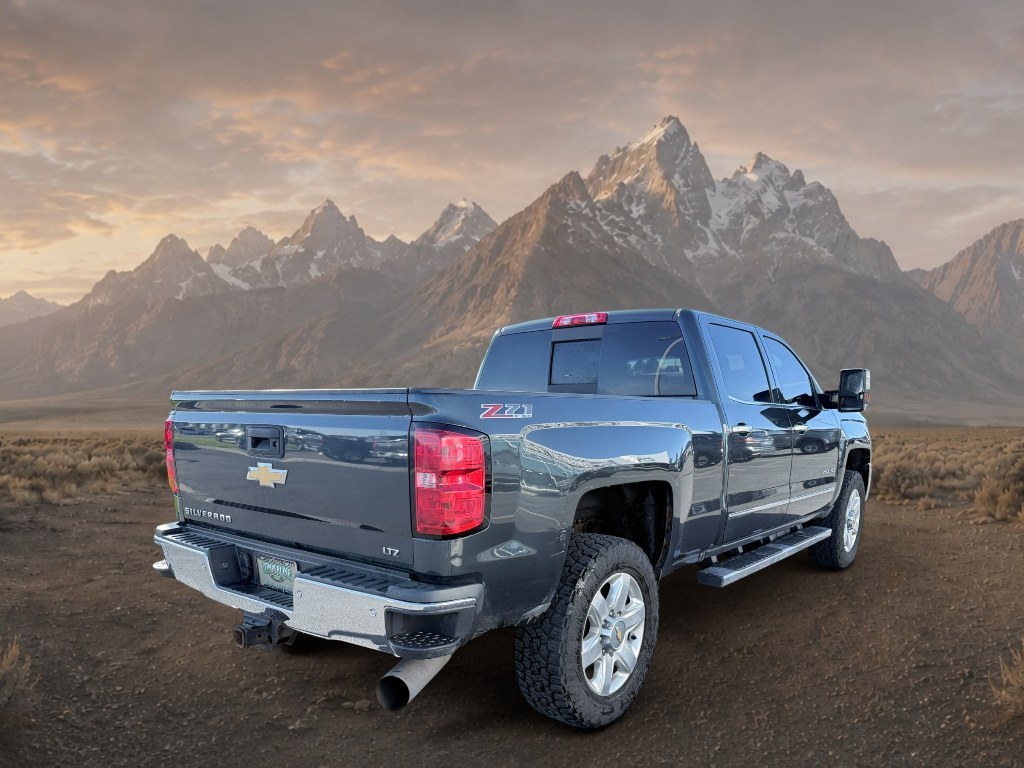2017 GRAY /Jet Black Chevrolet Silverado LTZ (1GC1KWEY9HF) with an V8, 6.6L engine, 6-speed automatic transmission, located at 1175 N Woodruff Ave, Idaho Falls, ID, 83401, 43.506901, -111.999657 - <b>Vehicle Details</b><br>Take on tough jobs and weekend adventures with confidence in this 2017 Chevrolet Silverado 2500 LTZ 4WD, now available in Idaho Falls, ID. Powered by a proven V8 6.6L Diesel engine, this heavy-duty pickup delivers impressive towing strength, refined comfort, and the dependa- Photo#4
