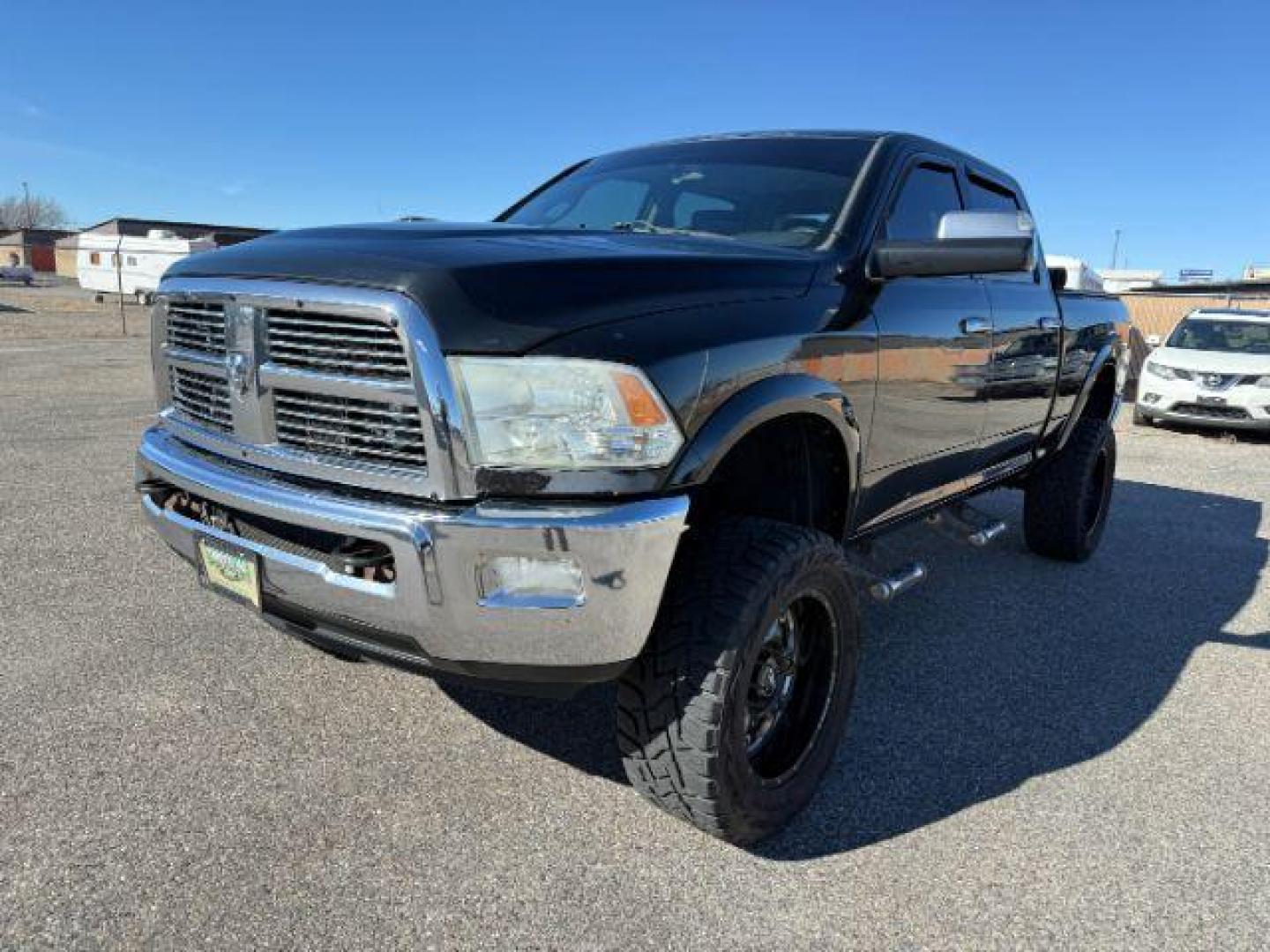 2012 BLACK /LEATHER Dodge RAM 2500 (3C6UD5FLOCG) with an 67L engine, Automatic transmission, located at 1175 N Woodruff Ave, Idaho Falls, ID, 83401, 43.506901, -111.999657 - At Timberline Auto, finding a great deal on your next vehicle is always easy! Our experienced sales staff's goal is to help find you the right vehicle at the right price! Our knowledgeable finance department has options for almost any credit score. We offer extended service contract options to prote - Photo#25