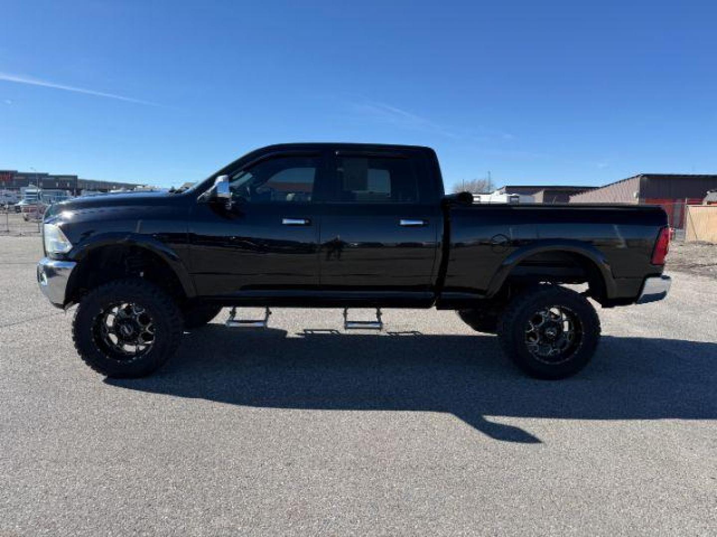 2012 BLACK /LEATHER Dodge RAM 2500 (3C6UD5FLOCG) with an 67L engine, Automatic transmission, located at 1175 N Woodruff Ave, Idaho Falls, ID, 83401, 43.506901, -111.999657 - At Timberline Auto, finding a great deal on your next vehicle is always easy! Our experienced sales staff's goal is to help find you the right vehicle at the right price! Our knowledgeable finance department has options for almost any credit score. We offer extended service contract options to prote - Photo#26