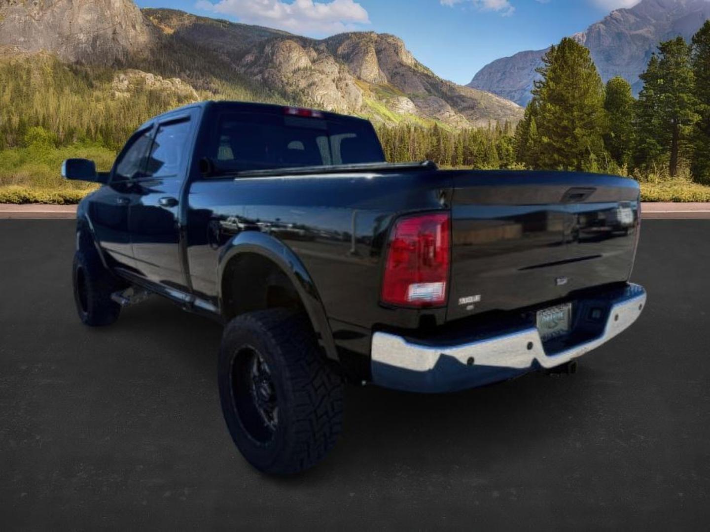 2012 BLACK /LEATHER Dodge RAM 2500 (3C6UD5FLOCG) with an 67L engine, Automatic transmission, located at 1175 N Woodruff Ave, Idaho Falls, ID, 83401, 43.506901, -111.999657 - At Timberline Auto, finding a great deal on your next vehicle is always easy! Our experienced sales staff's goal is to help find you the right vehicle at the right price! Our knowledgeable finance department has options for almost any credit score. We offer extended service contract options to prote - Photo#2