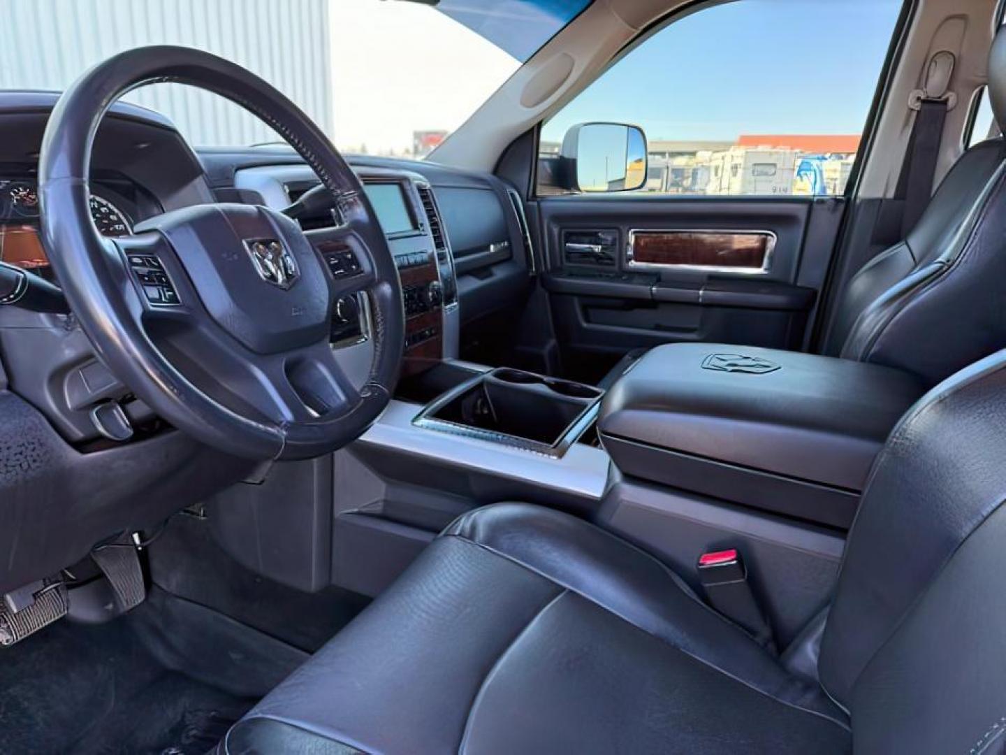 2012 BLACK /LEATHER Dodge RAM 2500 (3C6UD5FLOCG) with an 67L engine, Automatic transmission, located at 1175 N Woodruff Ave, Idaho Falls, ID, 83401, 43.506901, -111.999657 - At Timberline Auto, finding a great deal on your next vehicle is always easy! Our experienced sales staff's goal is to help find you the right vehicle at the right price! Our knowledgeable finance department has options for almost any credit score. We offer extended service contract options to prote - Photo#11