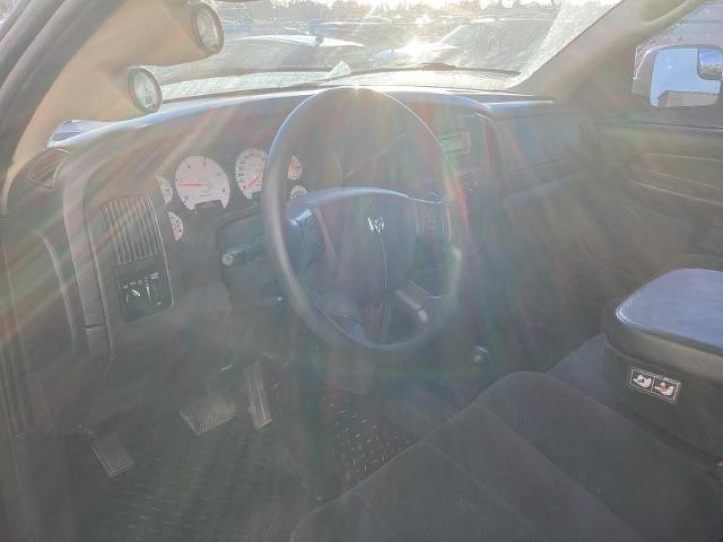 2004 Black /Dark Slate Gray Cloth Interior Dodge Ram 2500 SLT Quad Cab 4WD (3D7KU28C54G) with an 5.9L L6 OHV 24V TURBO DIESEL engine, AUTOMATIC transmission, located at 1235 N Woodruff Ave., Idaho Falls, 83401, (208) 523-1053, 43.507172, -112.000488 - Photo#8