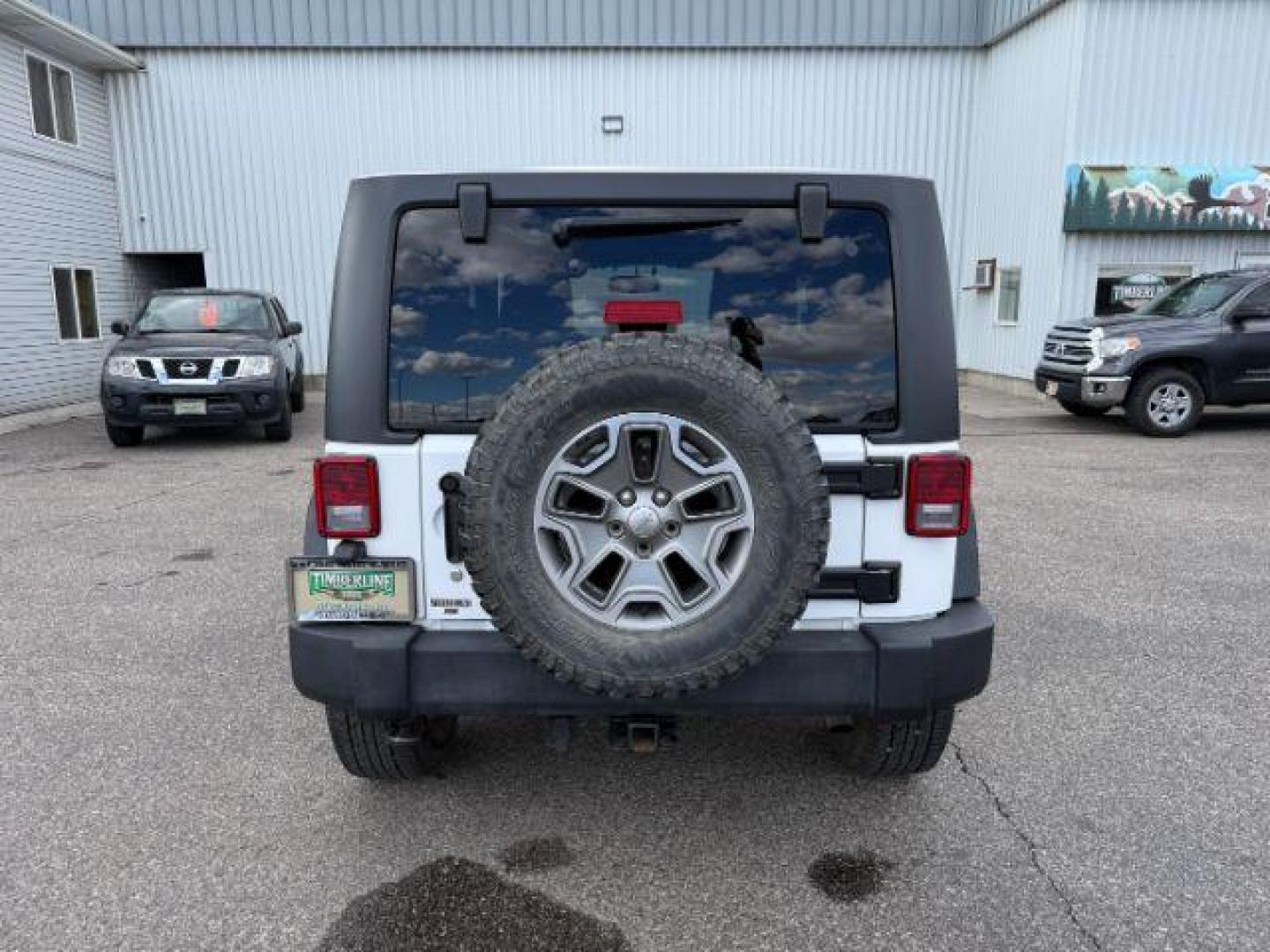 2014 WHITE /CLOTH Jeep WRANGLER (1C4BJWCG6EL) with an 36L V-6 gasoline direct injection engine, Automatic transmission, located at 1175 N Woodruff Ave, Idaho Falls, ID, 83401, 43.506901, -111.999657 - At Timberline Auto, finding a great deal on your next vehicle is always easy! Our experienced sales staff's goal is to help find you the right vehicle at the right price! Our knowledgeable finance department has options for almost any credit score. We offer extended service contract options to prote - Photo#26