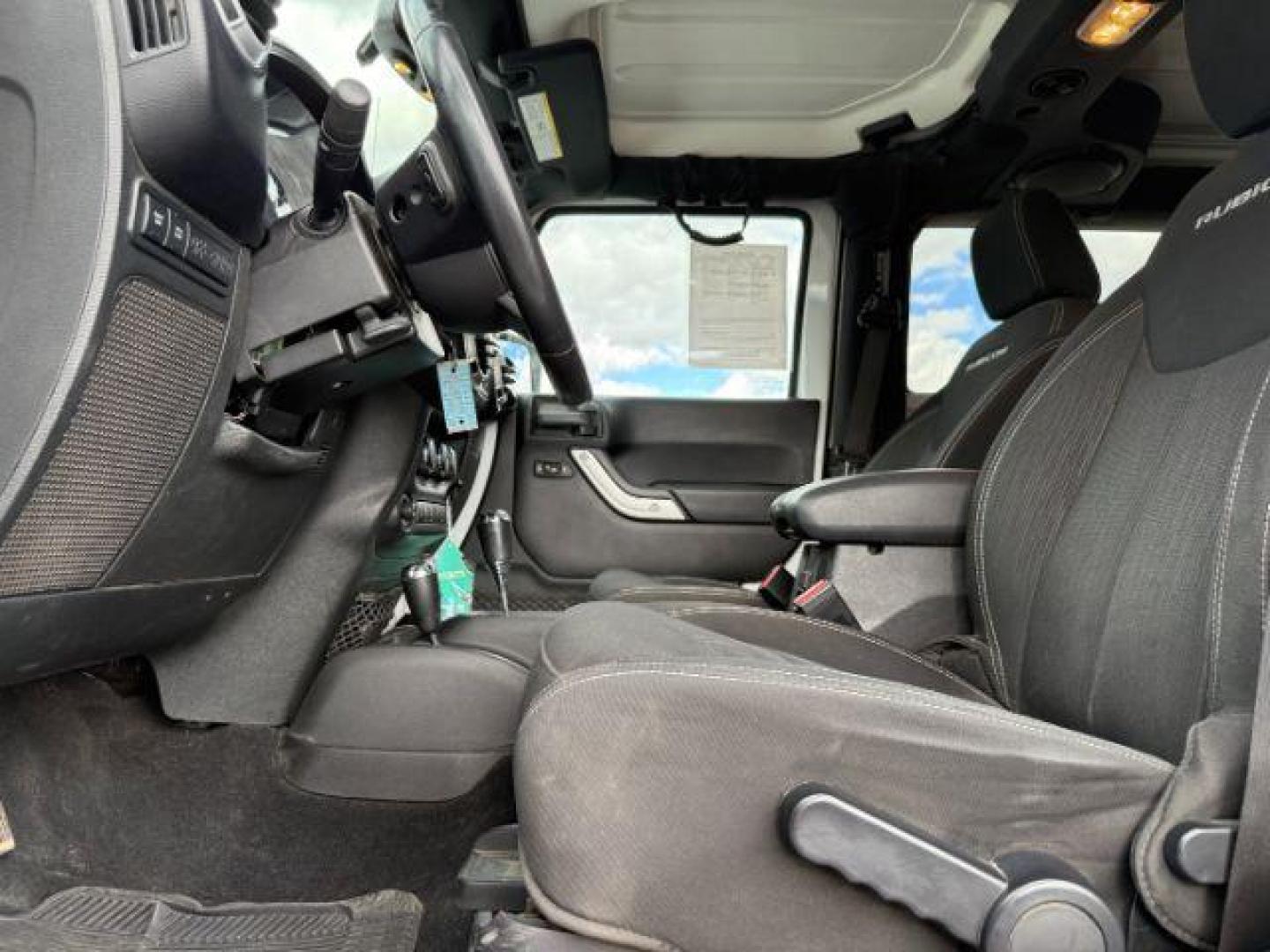 2014 WHITE /CLOTH Jeep WRANGLER (1C4BJWCG6EL) with an 36L V-6 gasoline direct injection engine, Automatic transmission, located at 1175 N Woodruff Ave, Idaho Falls, ID, 83401, 43.506901, -111.999657 - At Timberline Auto, finding a great deal on your next vehicle is always easy! Our experienced sales staff's goal is to help find you the right vehicle at the right price! Our knowledgeable finance department has options for almost any credit score. We offer extended service contract options to prote - Photo#34