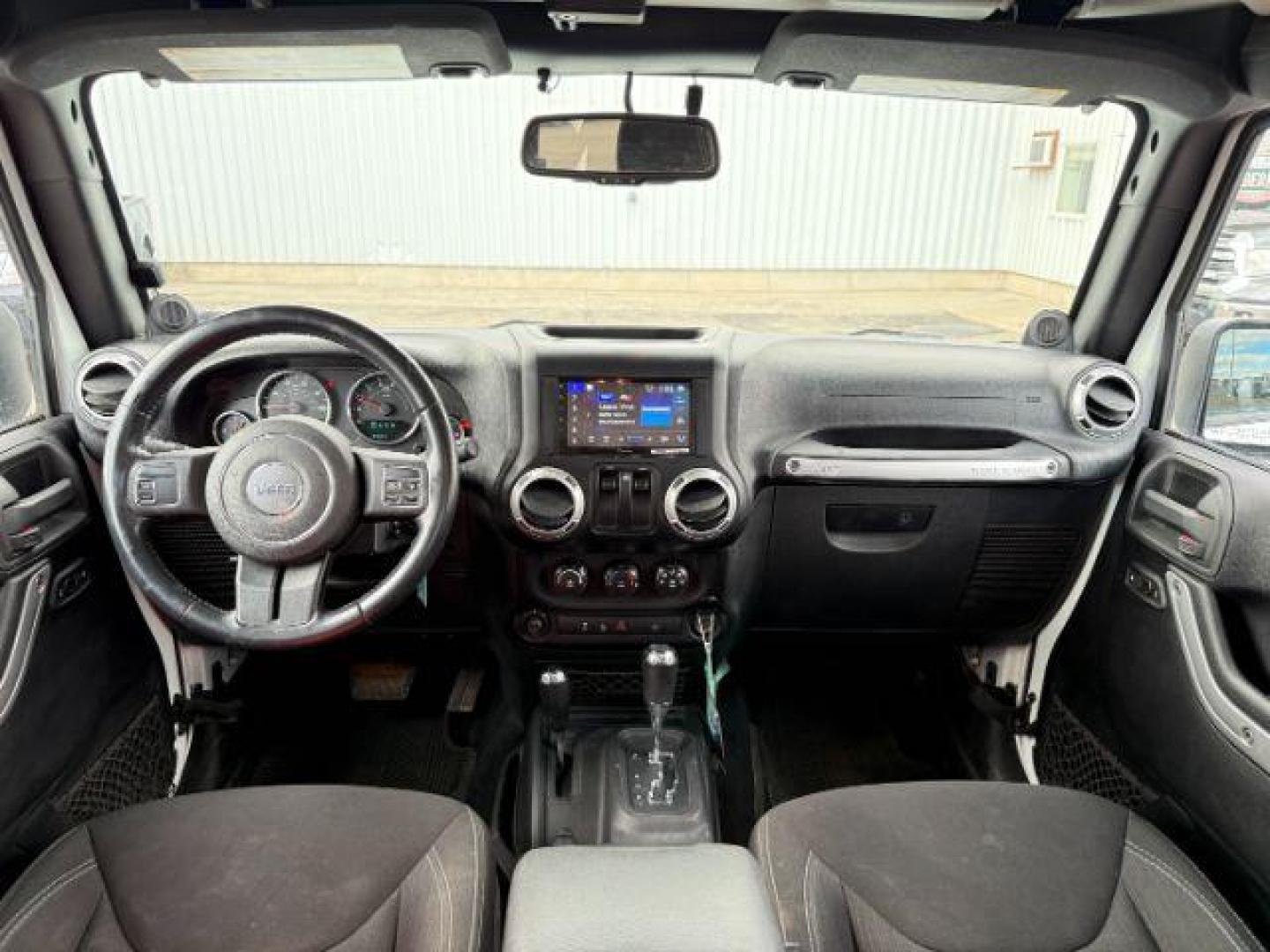 2014 WHITE /CLOTH Jeep WRANGLER (1C4BJWCG6EL) with an 36L V-6 gasoline direct injection engine, Automatic transmission, located at 1175 N Woodruff Ave, Idaho Falls, ID, 83401, 43.506901, -111.999657 - At Timberline Auto, finding a great deal on your next vehicle is always easy! Our experienced sales staff's goal is to help find you the right vehicle at the right price! Our knowledgeable finance department has options for almost any credit score. We offer extended service contract options to prote - Photo#44