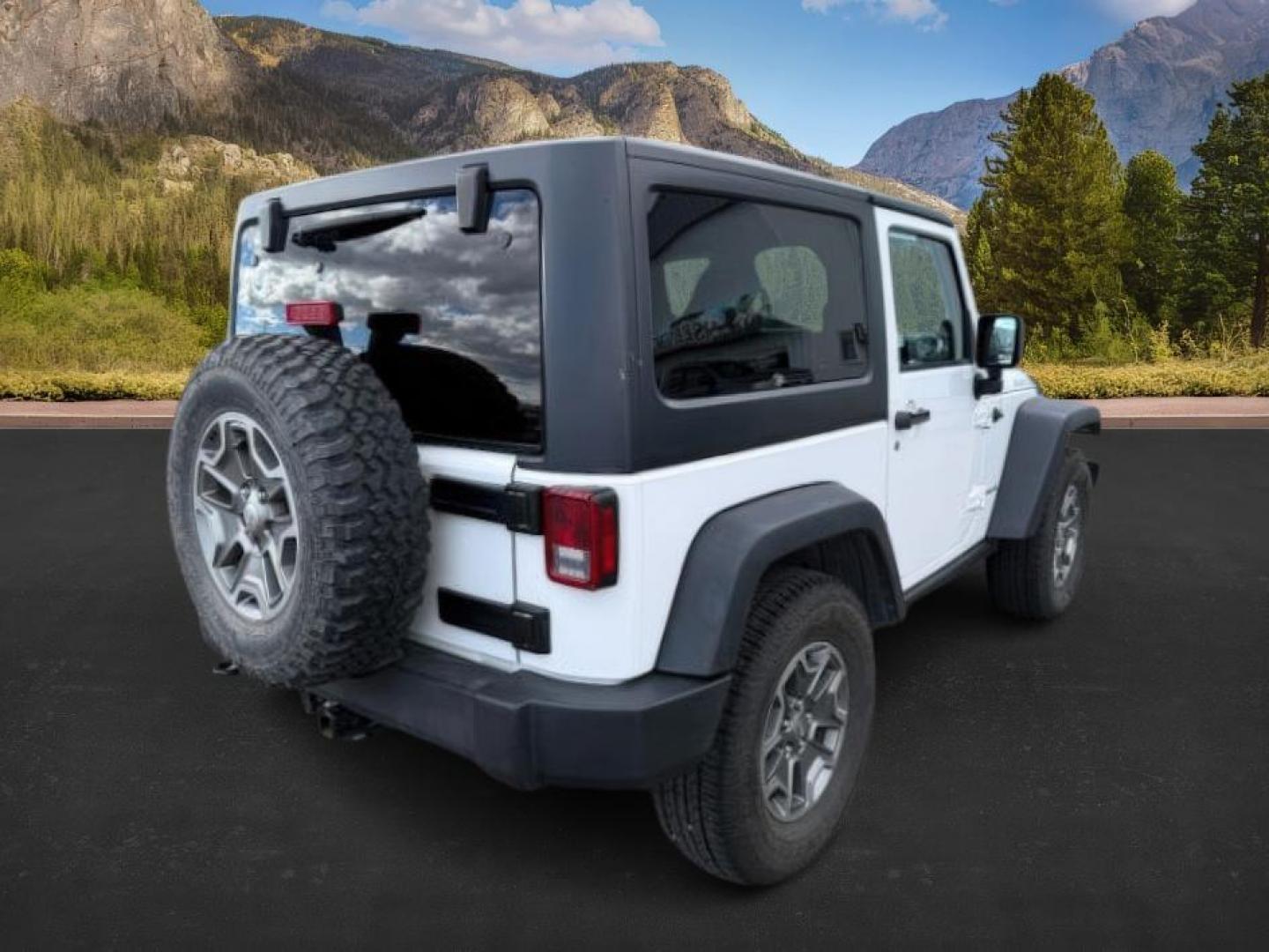 2014 WHITE /CLOTH JEEP WRANGLER RUBICON (1C4BJWCG6EL) with an 3.6L V-6 gasoline direct injection engine, AUTOMATIC transmission, located at 1235 N Woodruff Ave., Idaho Falls, 83401, (208) 523-1053, 43.507172, -112.000488 - Photo#4