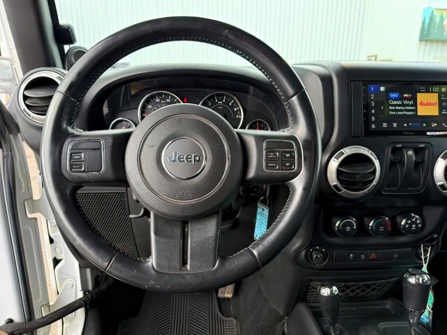 2014 WHITE /CLOTH JEEP WRANGLER RUBICON (1C4BJWCG6EL) with an 3.6L V-6 gasoline direct injection engine, AUTOMATIC transmission, located at 1235 N Woodruff Ave., Idaho Falls, 83401, (208) 523-1053, 43.507172, -112.000488 - Photo#13