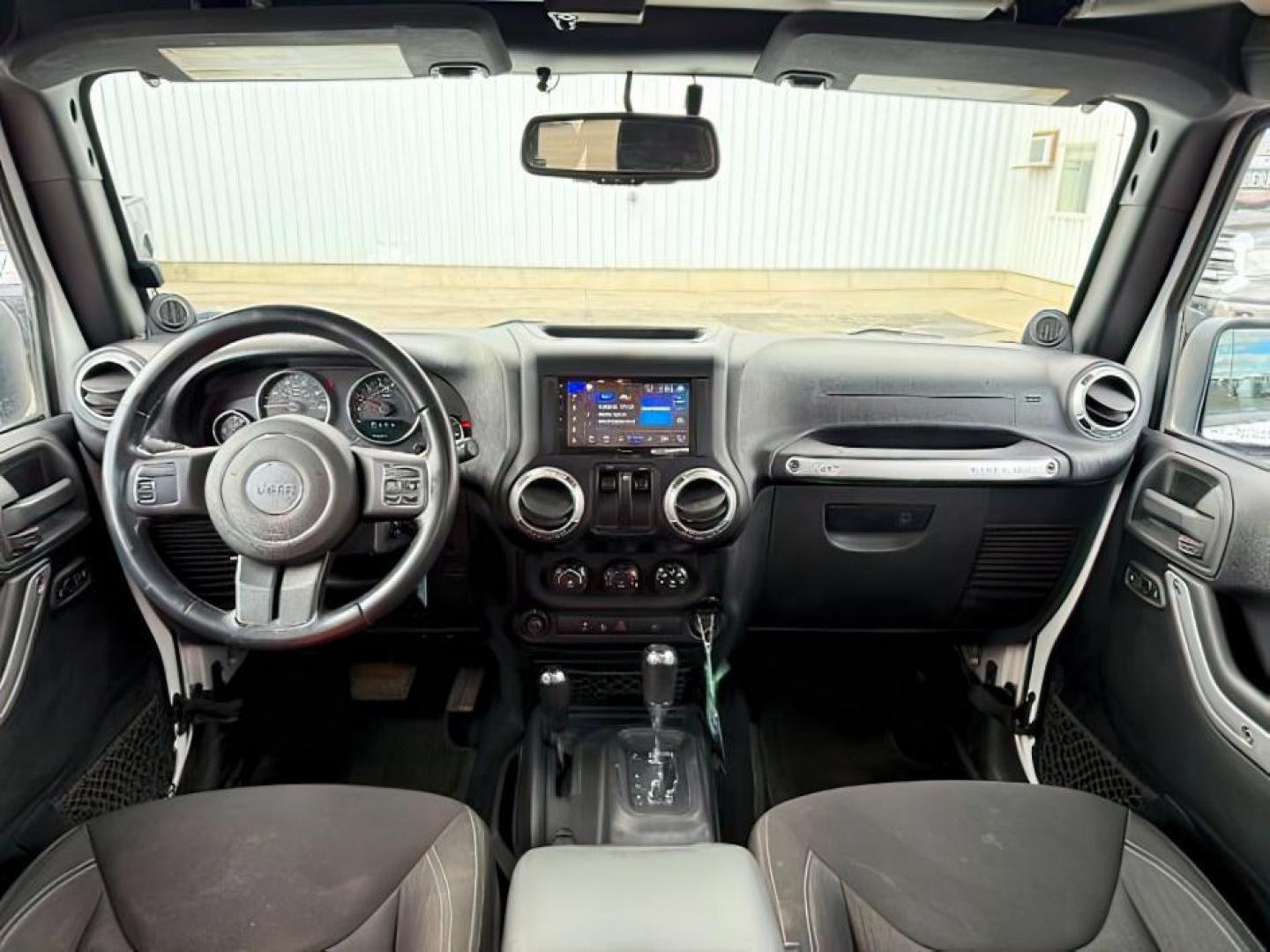 2014 WHITE /CLOTH JEEP WRANGLER RUBICON (1C4BJWCG6EL) with an 3.6L V-6 gasoline direct injection engine, AUTOMATIC transmission, located at 1235 N Woodruff Ave., Idaho Falls, 83401, (208) 523-1053, 43.507172, -112.000488 - Photo#21