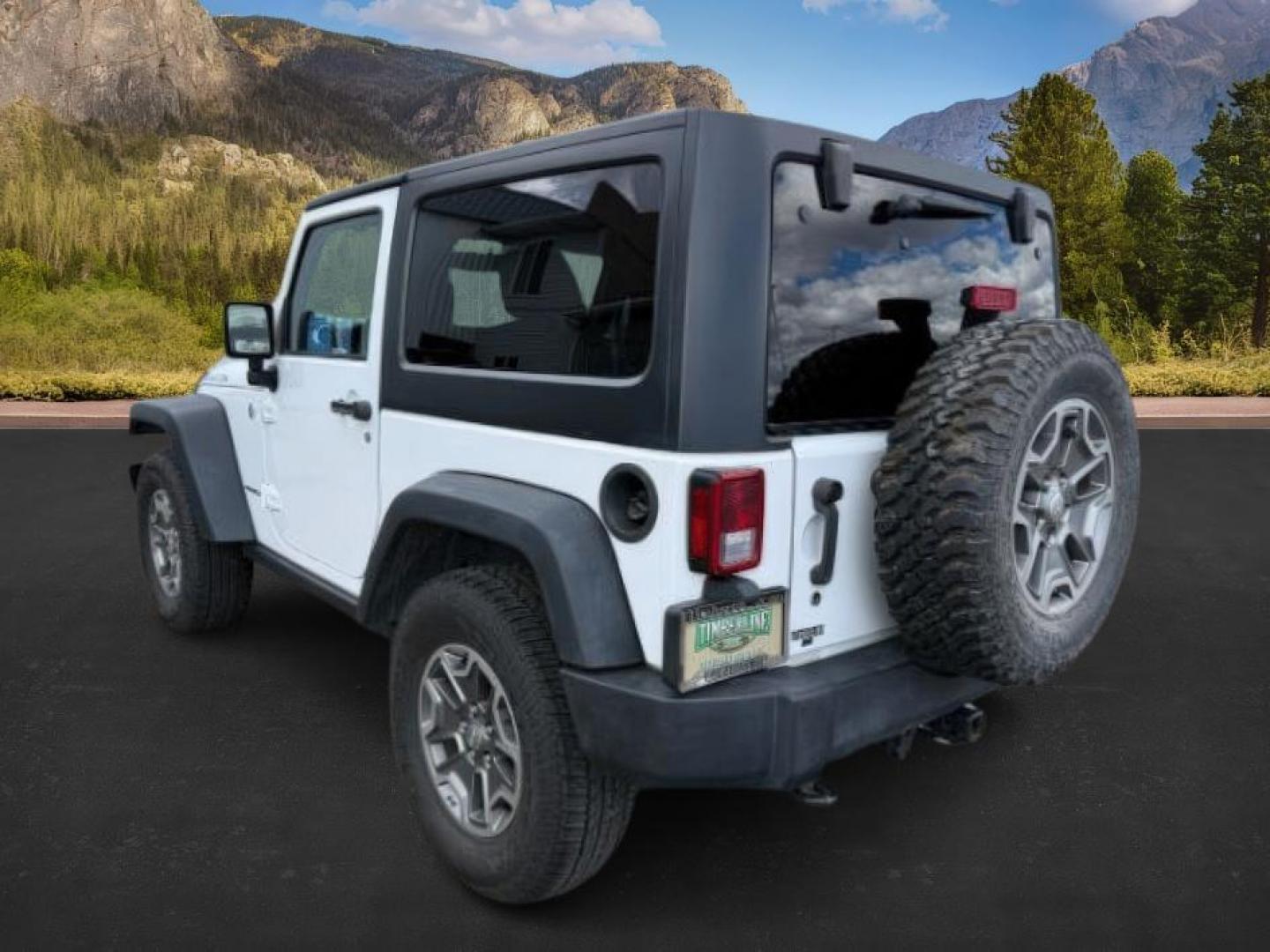 2014 WHITE /CLOTH Jeep WRANGLER (1C4BJWCG6EL) with an 36L V-6 gasoline direct injection engine, Automatic transmission, located at 1175 N Woodruff Ave, Idaho Falls, ID, 83401, 43.506901, -111.999657 - At Timberline Auto, finding a great deal on your next vehicle is always easy! Our experienced sales staff's goal is to help find you the right vehicle at the right price! Our knowledgeable finance department has options for almost any credit score. We offer extended service contract options to prote - Photo#2