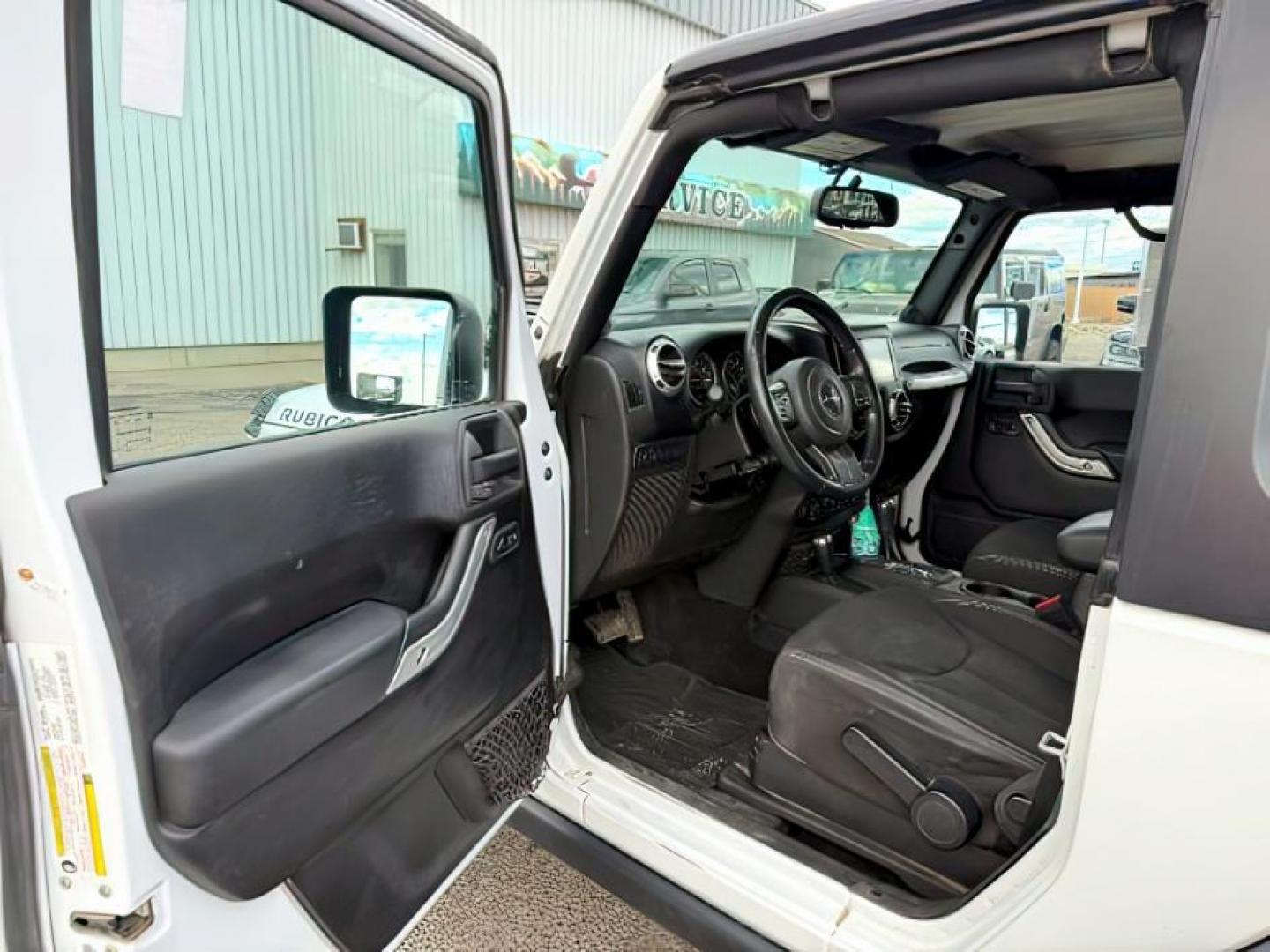 2014 WHITE /CLOTH Jeep WRANGLER (1C4BJWCG6EL) with an 36L V-6 gasoline direct injection engine, Automatic transmission, located at 1175 N Woodruff Ave, Idaho Falls, ID, 83401, 43.506901, -111.999657 - At Timberline Auto, finding a great deal on your next vehicle is always easy! Our experienced sales staff's goal is to help find you the right vehicle at the right price! Our knowledgeable finance department has options for almost any credit score. We offer extended service contract options to prote - Photo#10