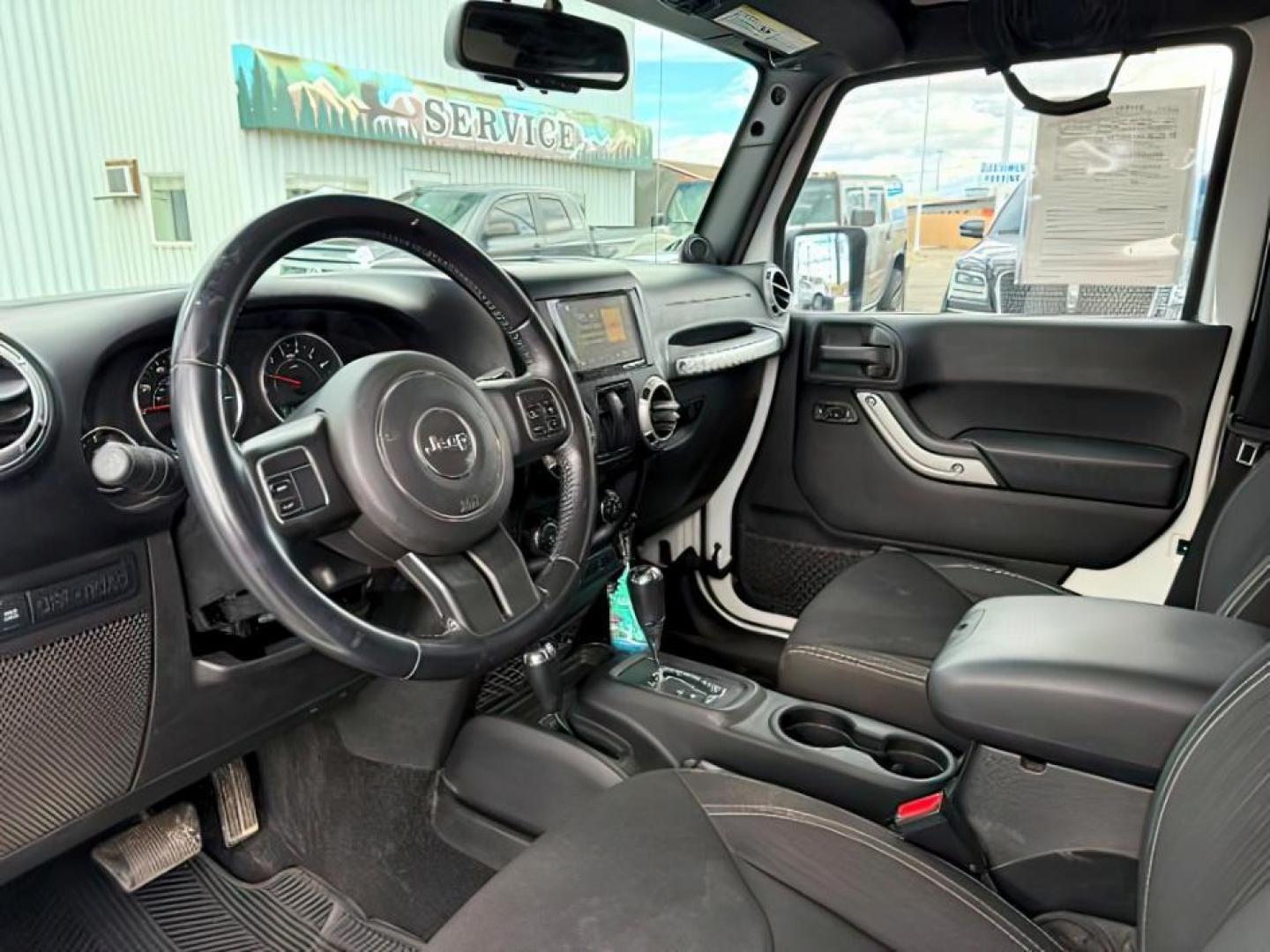 2014 WHITE /CLOTH Jeep WRANGLER (1C4BJWCG6EL) with an 36L V-6 gasoline direct injection engine, Automatic transmission, located at 1175 N Woodruff Ave, Idaho Falls, ID, 83401, 43.506901, -111.999657 - At Timberline Auto, finding a great deal on your next vehicle is always easy! Our experienced sales staff's goal is to help find you the right vehicle at the right price! Our knowledgeable finance department has options for almost any credit score. We offer extended service contract options to prote - Photo#12