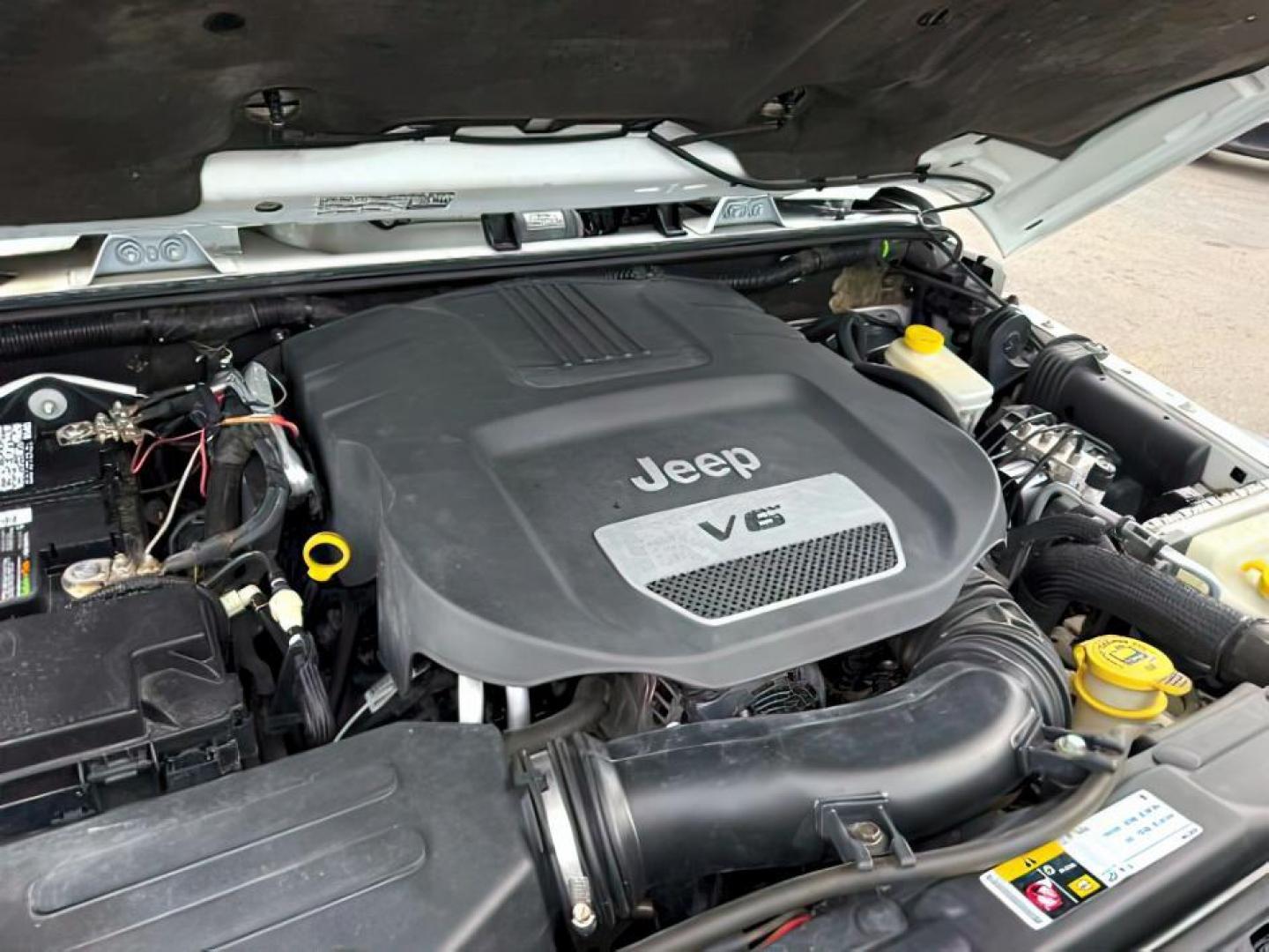 2014 WHITE /CLOTH Jeep WRANGLER (1C4BJWCG6EL) with an 36L V-6 gasoline direct injection engine, Automatic transmission, located at 1175 N Woodruff Ave, Idaho Falls, ID, 83401, 43.506901, -111.999657 - At Timberline Auto, finding a great deal on your next vehicle is always easy! Our experienced sales staff's goal is to help find you the right vehicle at the right price! Our knowledgeable finance department has options for almost any credit score. We offer extended service contract options to prote - Photo#22