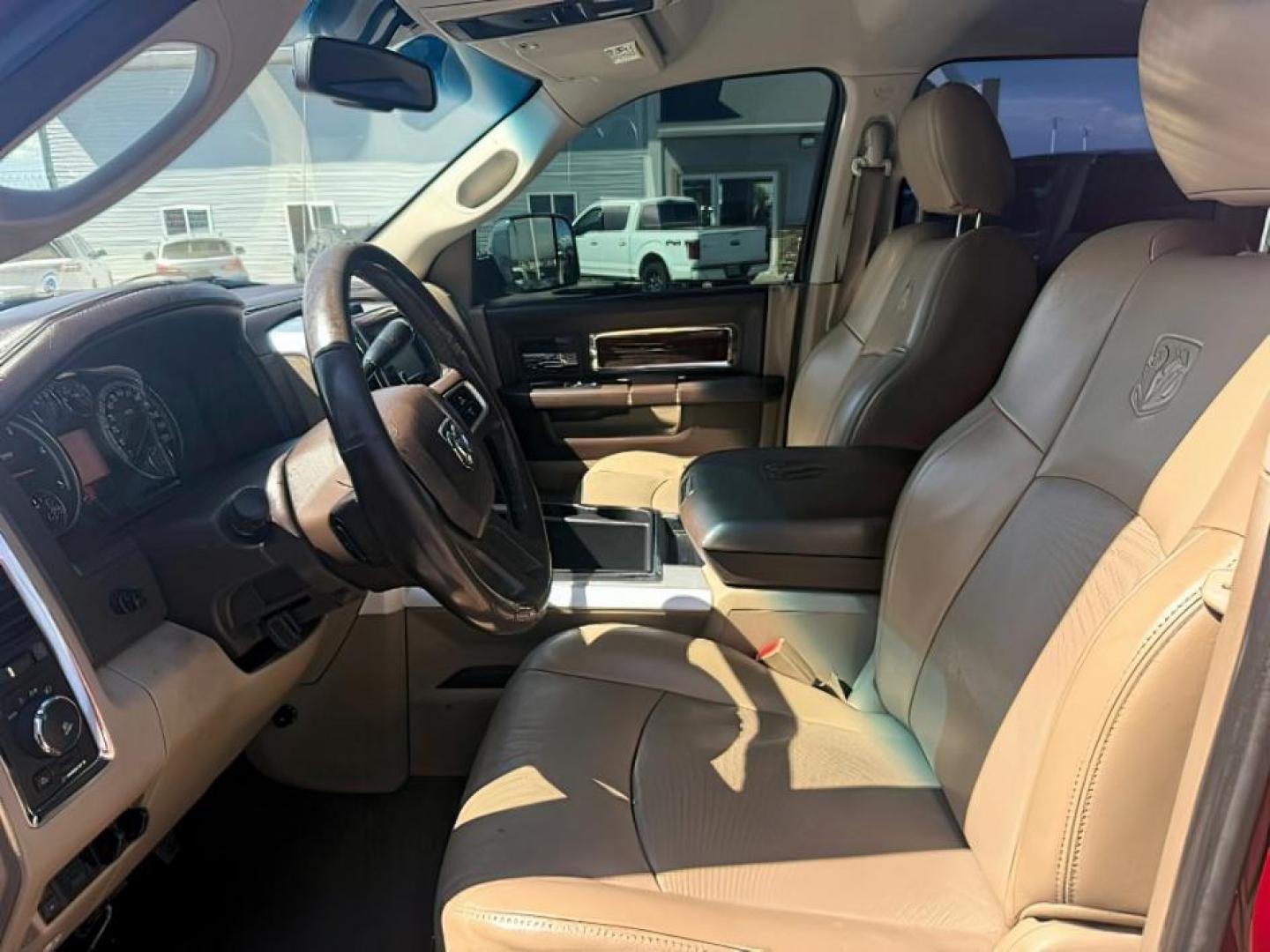 2011 MAROON /Light Pebble Beige/Bark Brown Leather Interior Dodge Ram 2500 (3D7UT2HL8BG) with an 67L L6 OHV 24V TURBO DIESEL engine, Automatic transmission, located at 1175 N Woodruff Ave, Idaho Falls, ID, 83401, 43.506901, -111.999657 - At Timberline Auto, finding a great deal on your next vehicle is always easy! Our experienced sales staff's goal is to help find you the right vehicle at the right price! Our knowledgeable finance department has options for almost any credit score. We offer extended service contract options to prote - Photo#10